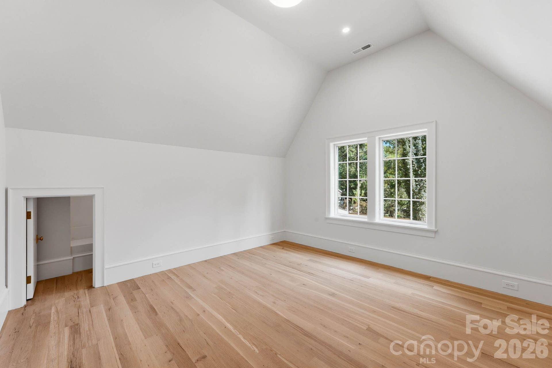 Upper Bedroom (14'x14') Storage Room /Closet on the left & it has a W.I.C. to the right