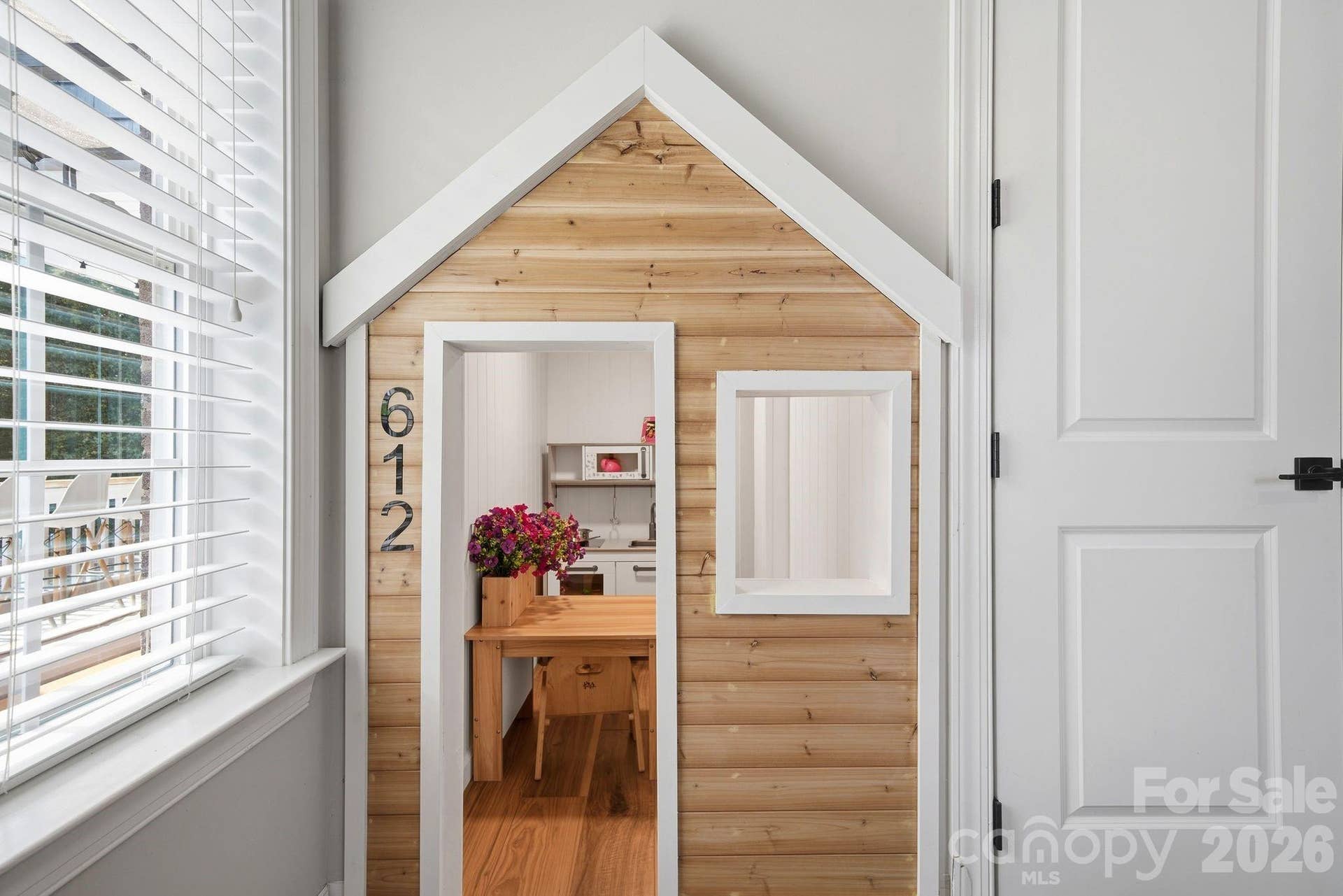 Custom built in playhouse/hiding nook