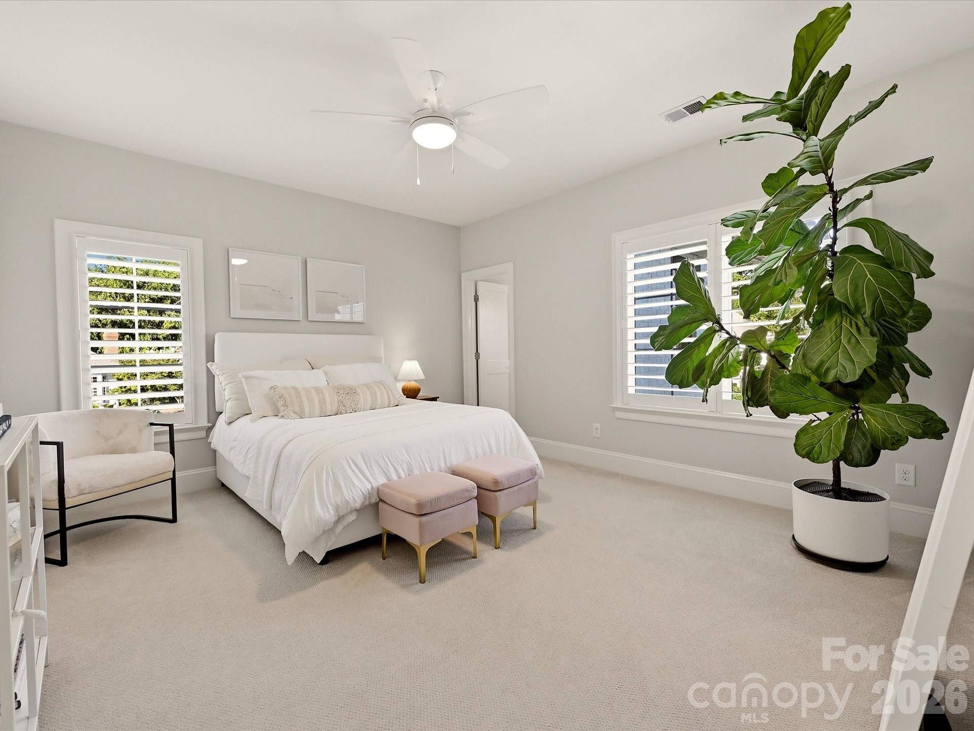 Bedroom 3 offers a bright, spacious retreat with multiple windows, soft neutral finishes, and plenty of room for comfortable furnishings.