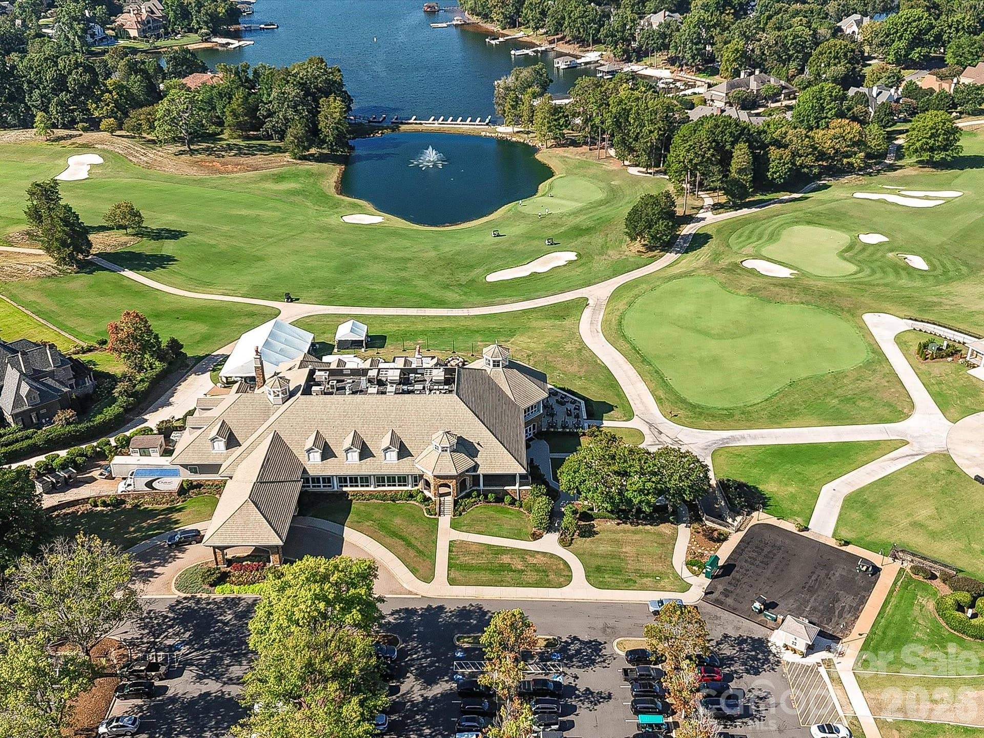 The Peninsula offers an exceptional amenity experience with championship golf, resort-style pools, tennis and pickleball courts, clubhouse facilities, and a scenic setting along Lake Norman.