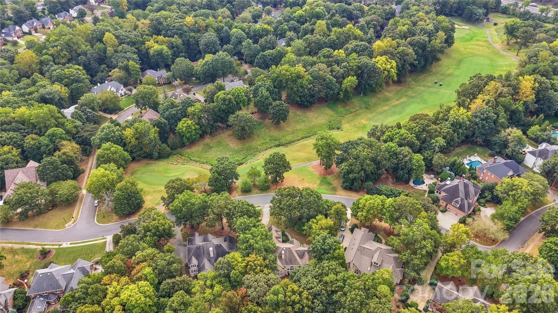 7425 Seton House Lane, Charlotte, NC 28277 Home has a front view of the 5th hole tee box