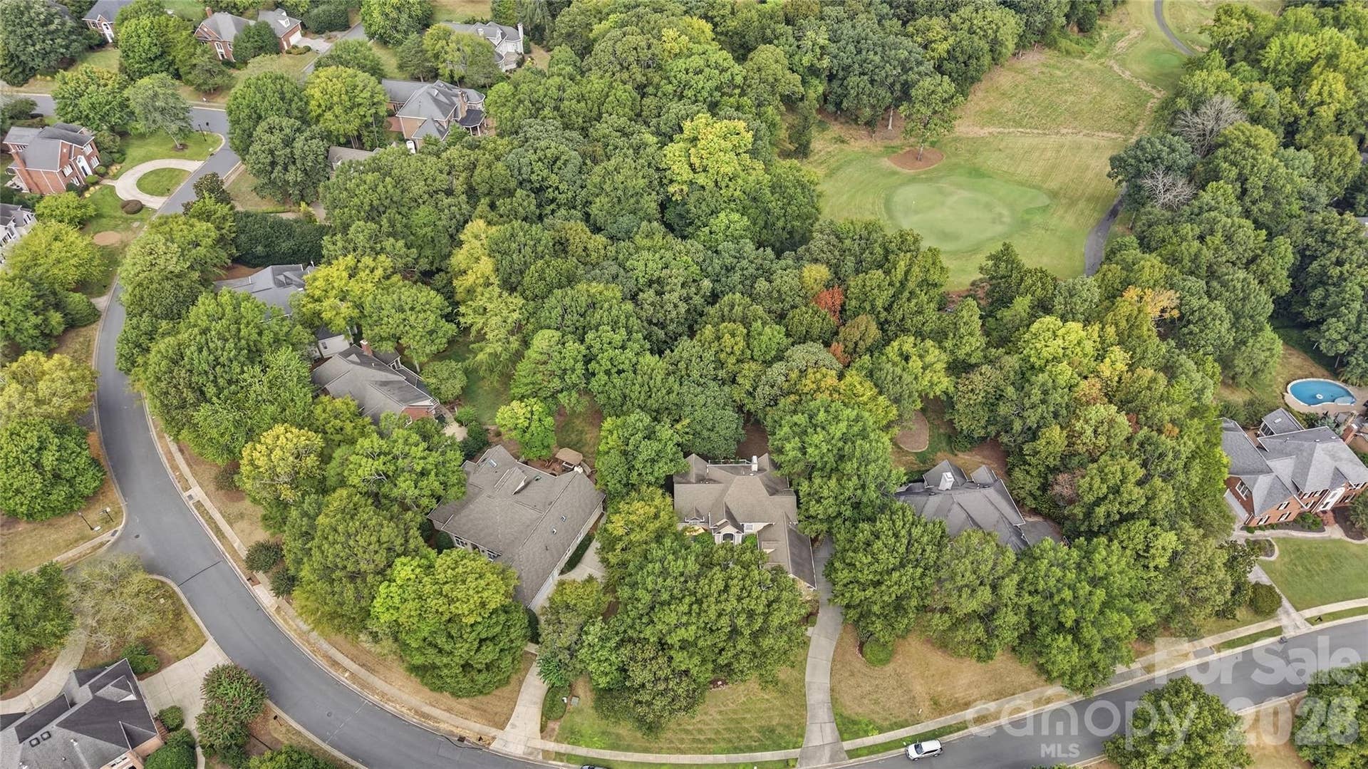 7425 Seton House Lane, Charlotte, NC 28277 Home has a rear long-range view of the 4th hole fairway