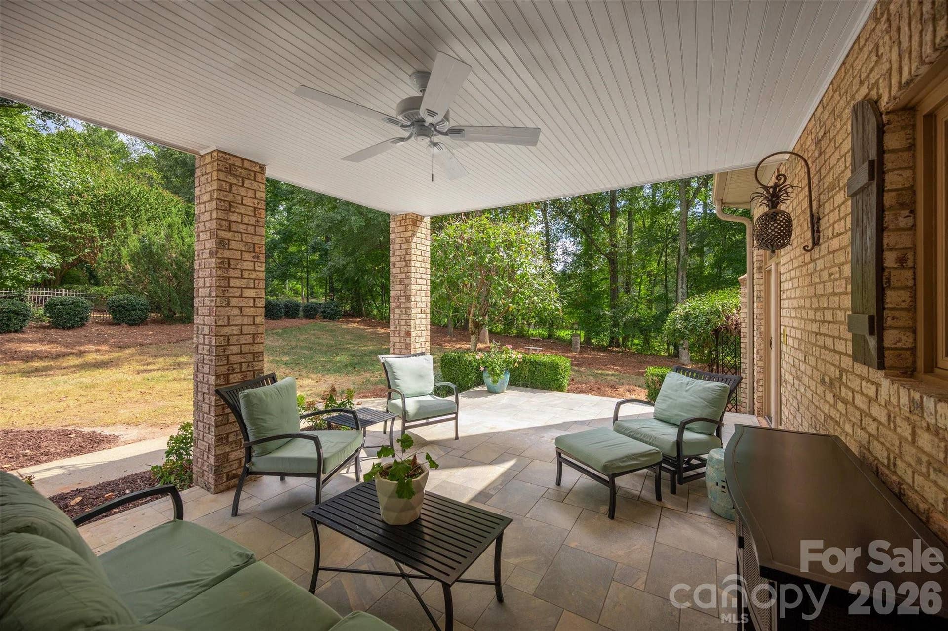 1005 Firethorne Club Drive, Marvin, NC 28173 Covered rear porch with terrace above