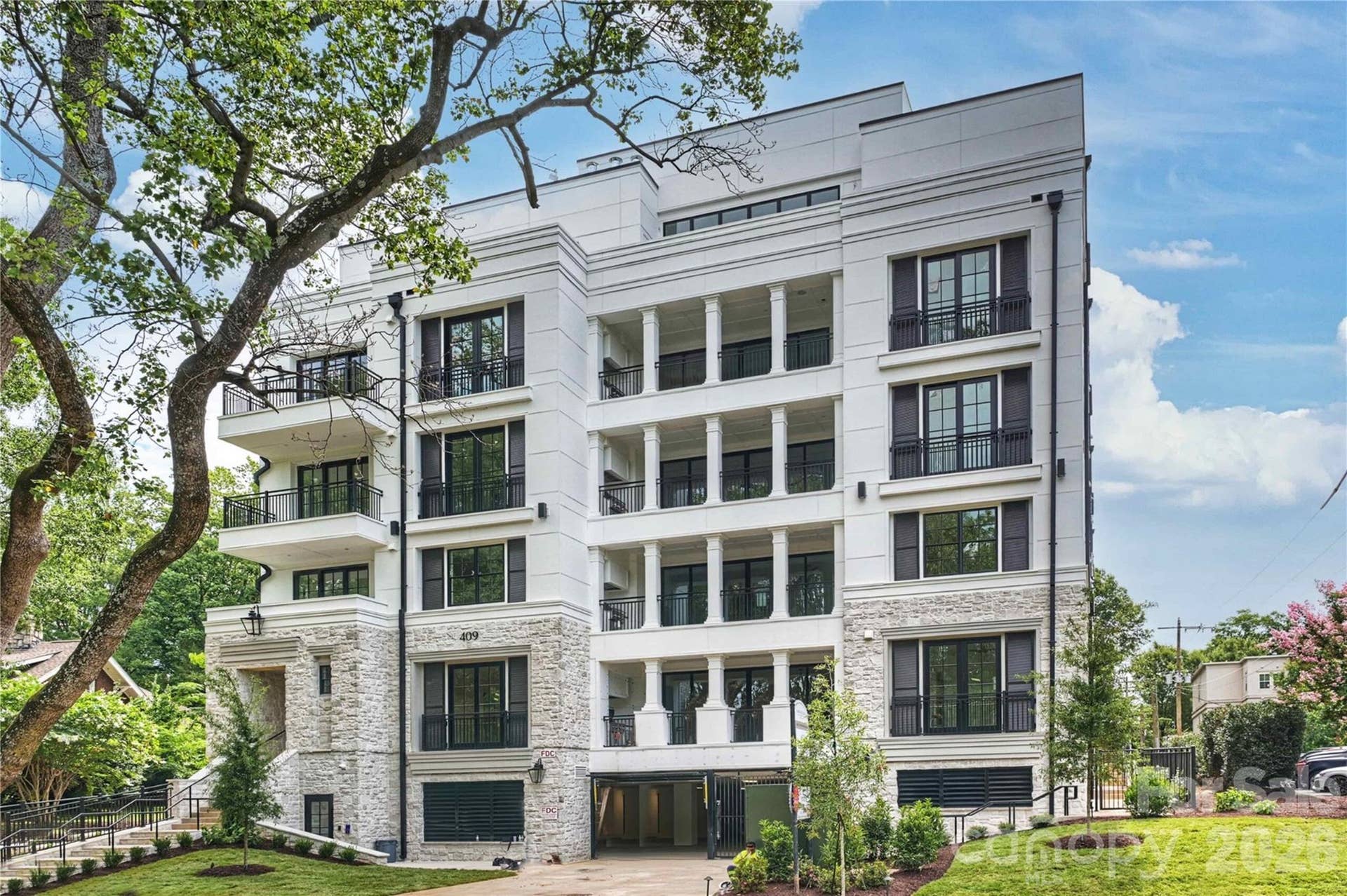 409 Queens Road, #503, Charlotte, NC 28207 Four09 Queens. A refined architectural statement in the heart of Myers Park, blending timeless design, private outdoor spaces and boutique luxury living in an intimate residential setting.