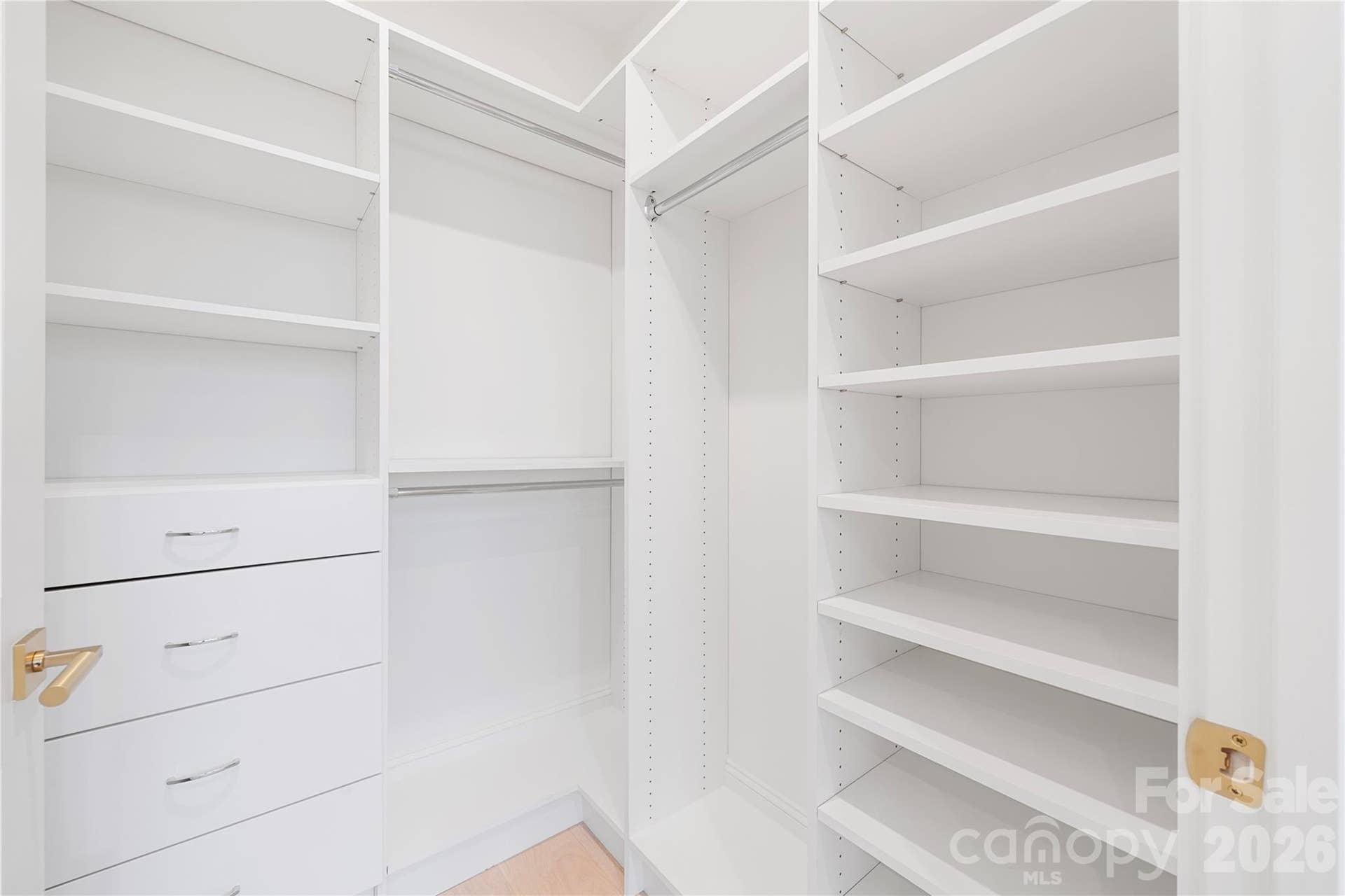 409 Queens Road, #503, Charlotte, NC 28207 Extending Bedroom 2's suite aspect, the walk-in closet provides ample built-in shelving, drawers and hanging space.