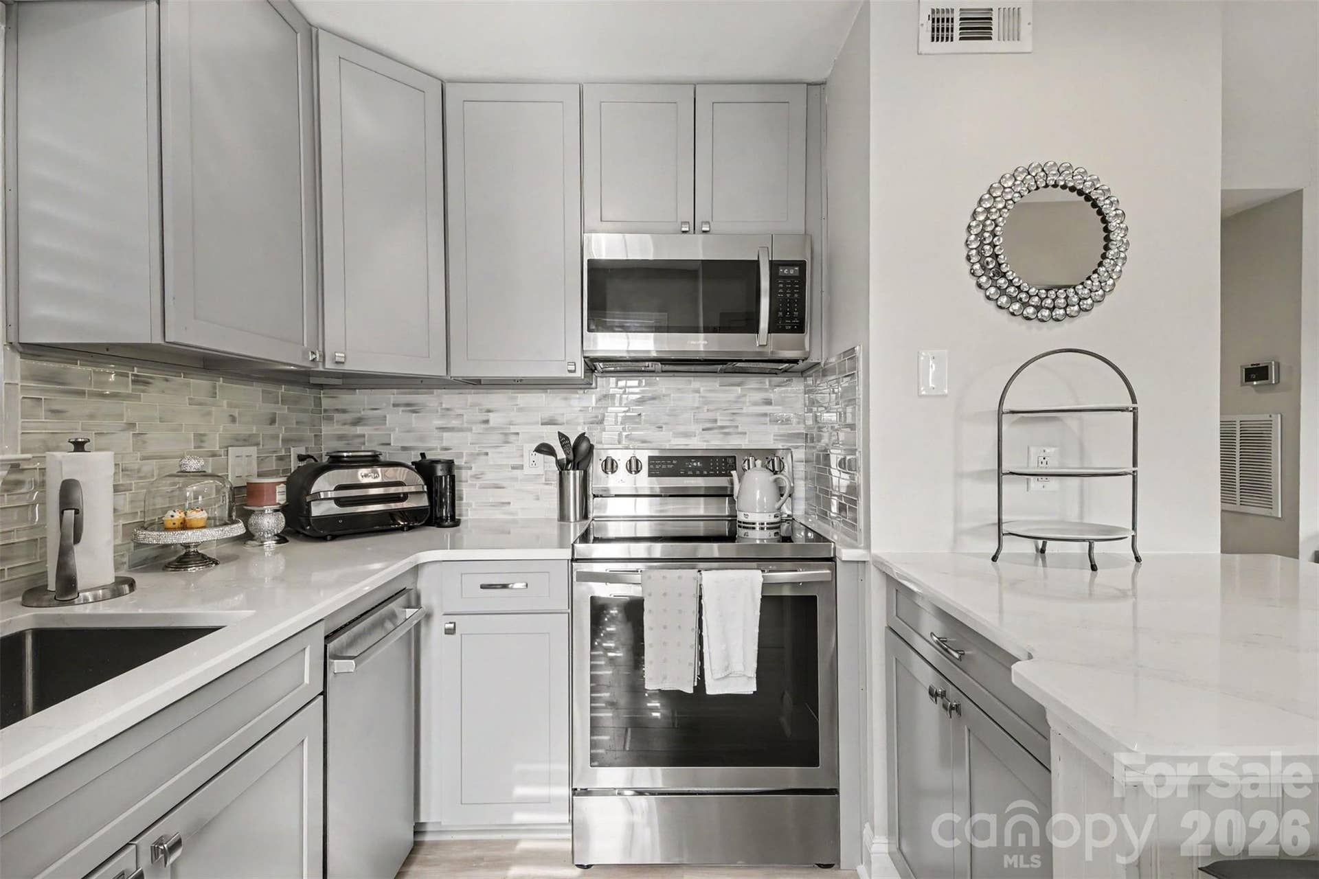 Spacious kitchen with new 38-inch cabinets with pull-outs.
