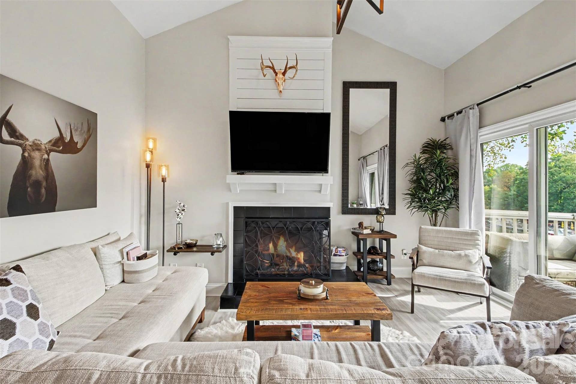 New sliding doors, vaulted ceilings offering tons of natural light.