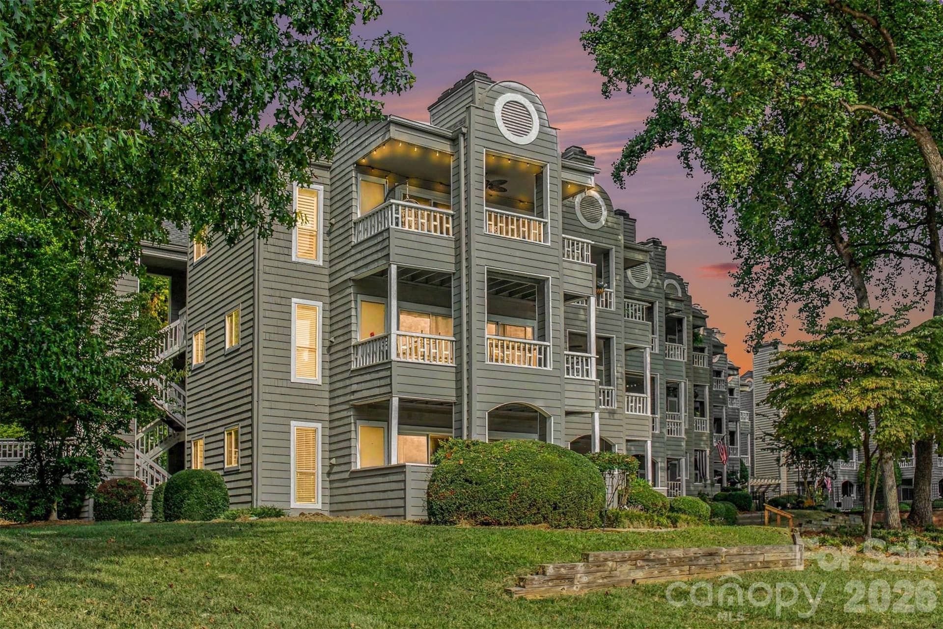 End unit condo with large balcony offering privacy with water and harbor views.