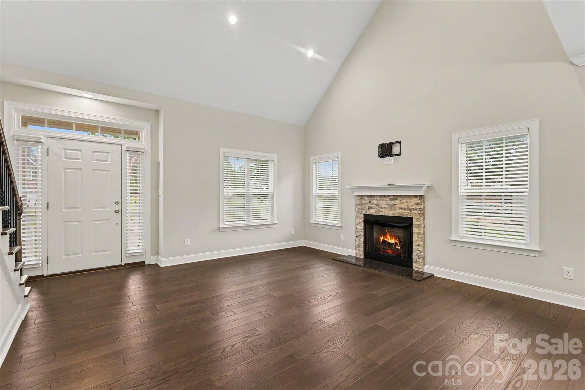 Open living room with vaulted ceiling