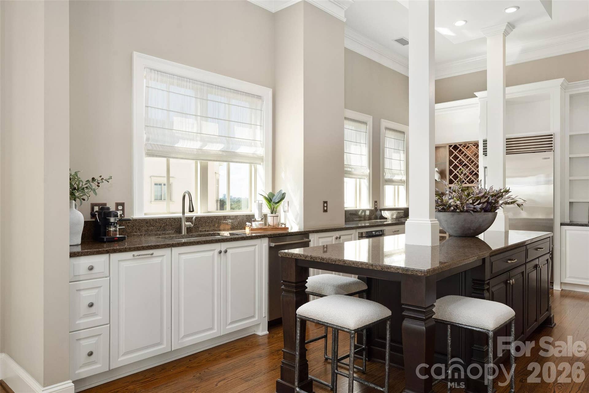 2823 Providence Road, #280, Charlotte, NC 28211 Kitchen island with seating and windows over the sink