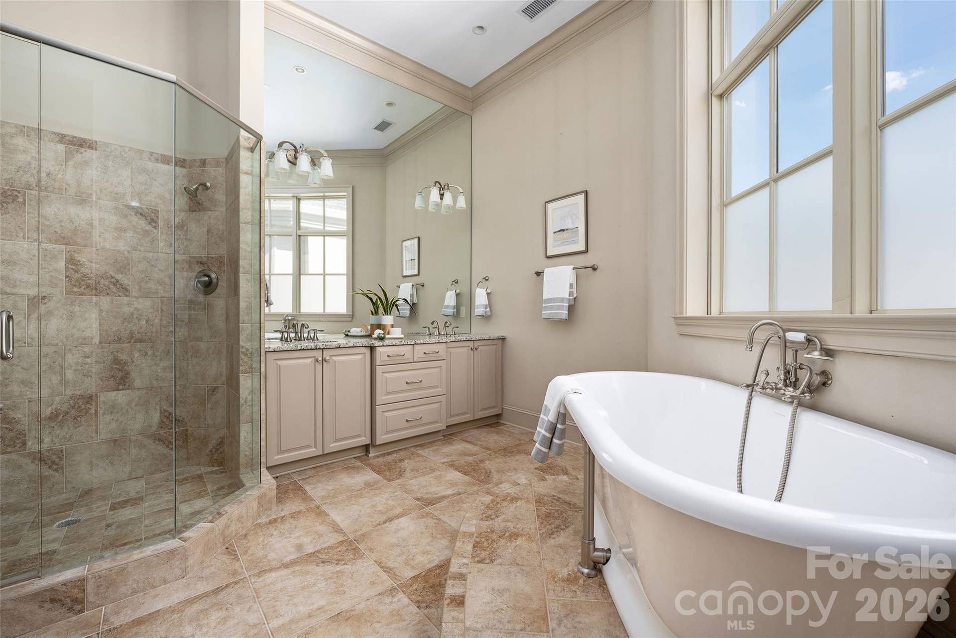 2823 Providence Road, #280, Charlotte, NC 28211 Primary bath with glass shower, double vanity and soaking tub