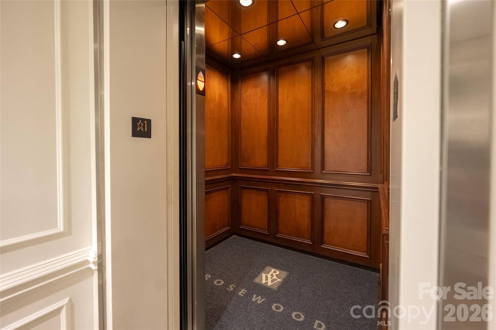 2823 Providence Road, #280, Charlotte, NC 28211 Wood-paneled elevator to the eighth floor