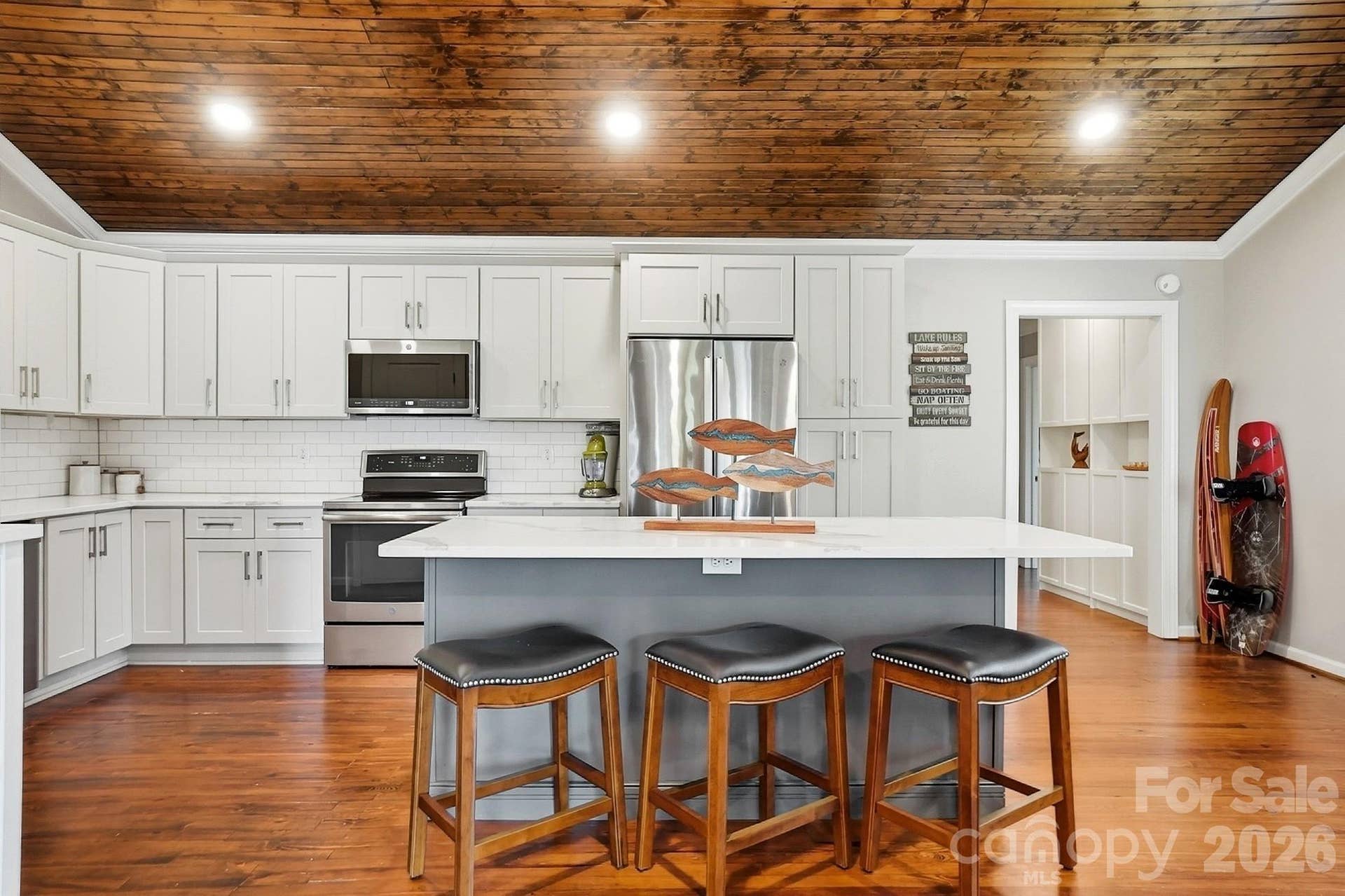 17424 Grasshopper Lane, Charlotte, NC 28278 Beautiful kitchen featuring stainless steel appliances, center island, and plenty of counter space