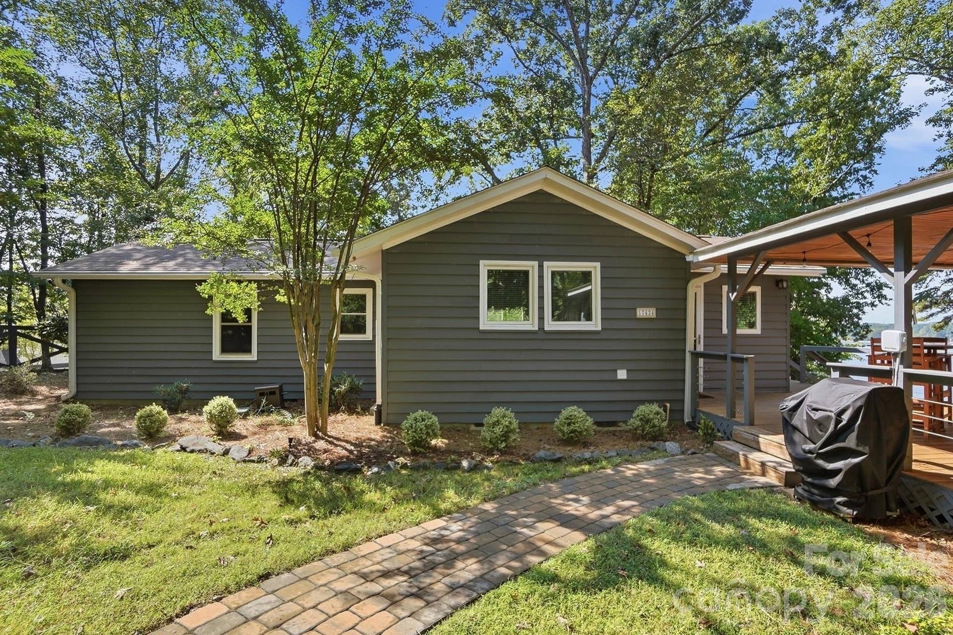17424 Grasshopper Lane, Charlotte, NC 28278 Perfect for a weekend retreat or full-time living this updated one level home has tons of character