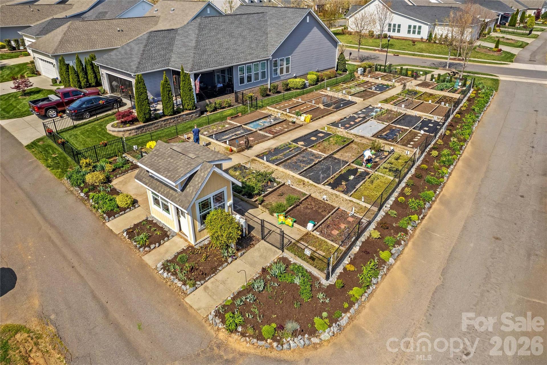 Plots available in the community garden within walking distance to this home.
