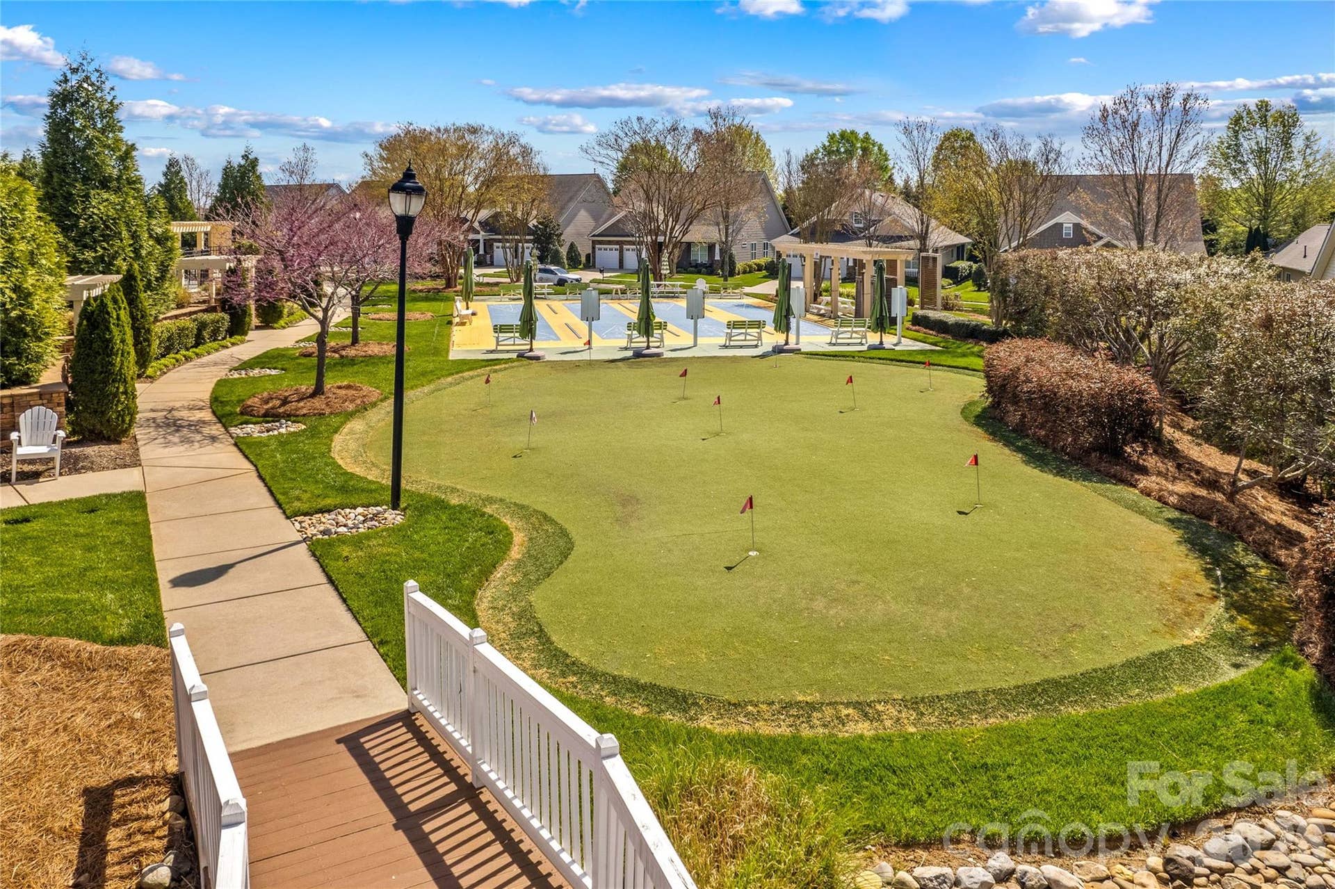 Putting green and shuffleboard courts