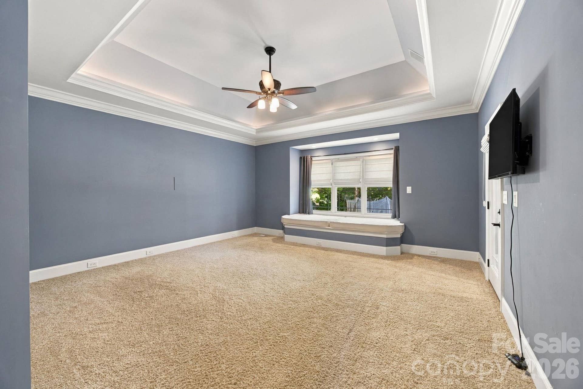 7481 Brotherton Road, Denver, NC 28037 Main Level Primary Suite with window settee