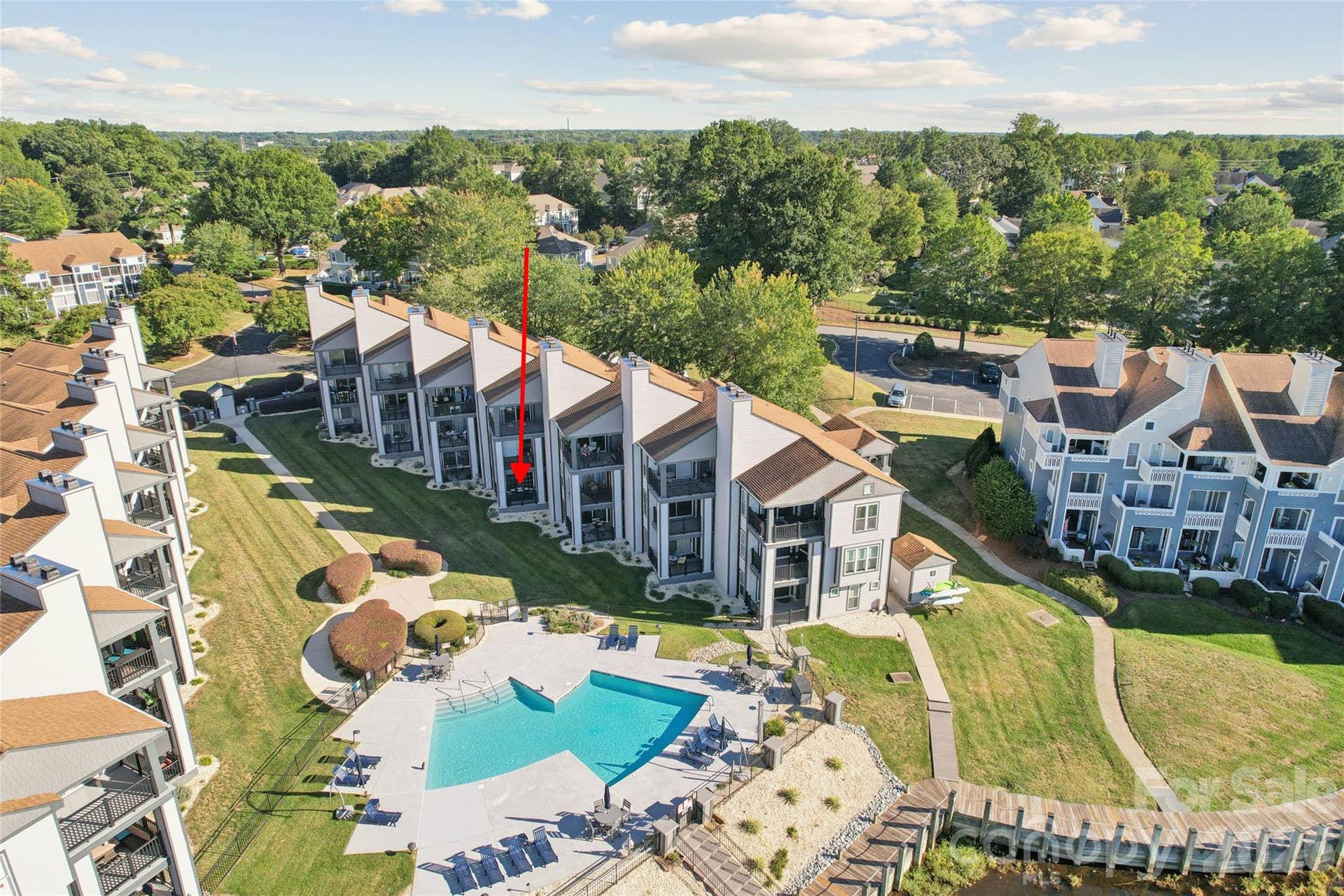 Ground floor unit with views of the pool and year round lake views