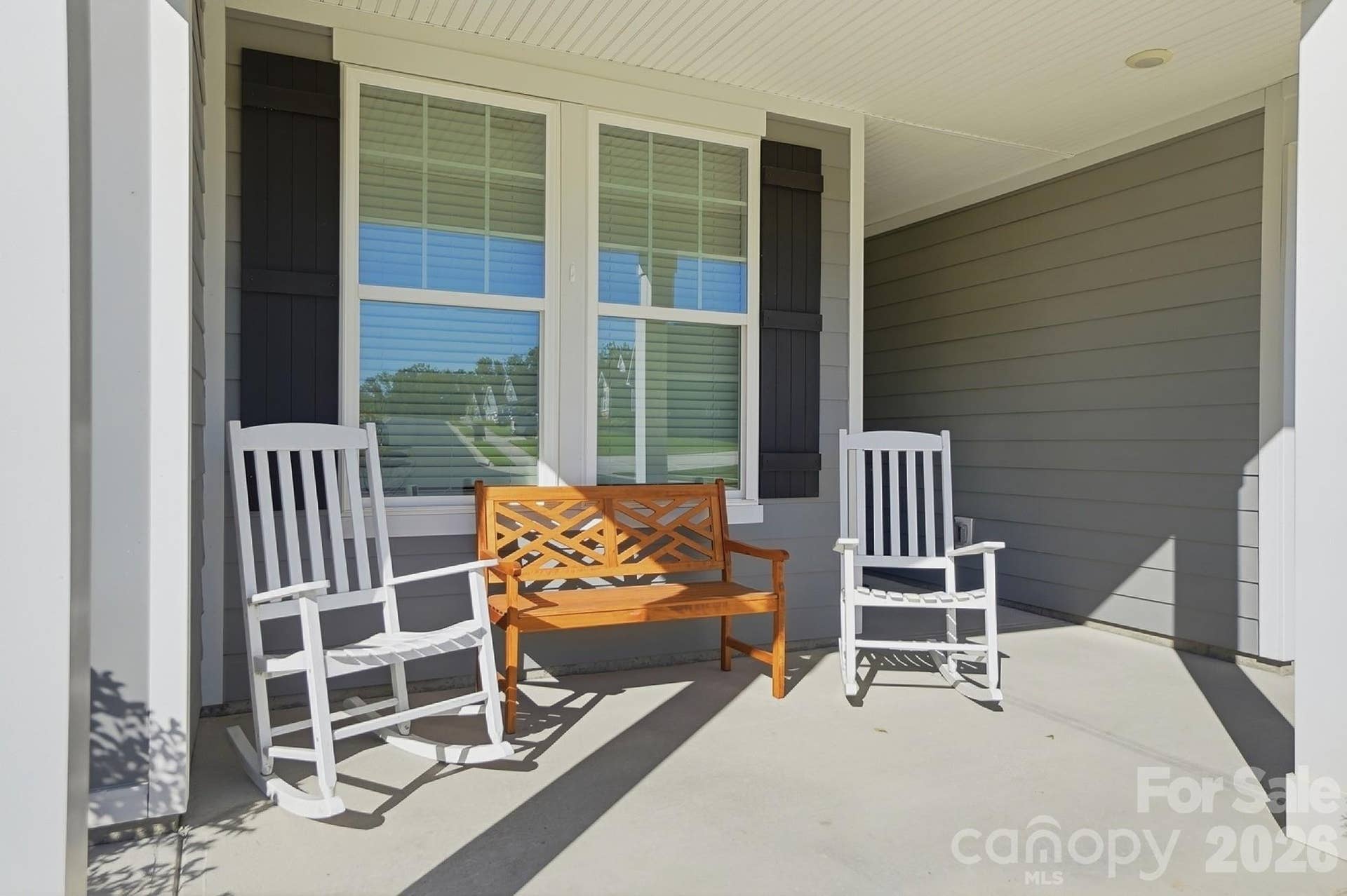 8032 Longwaters Court, York, SC 29745 Welcoming rocking chair front porch