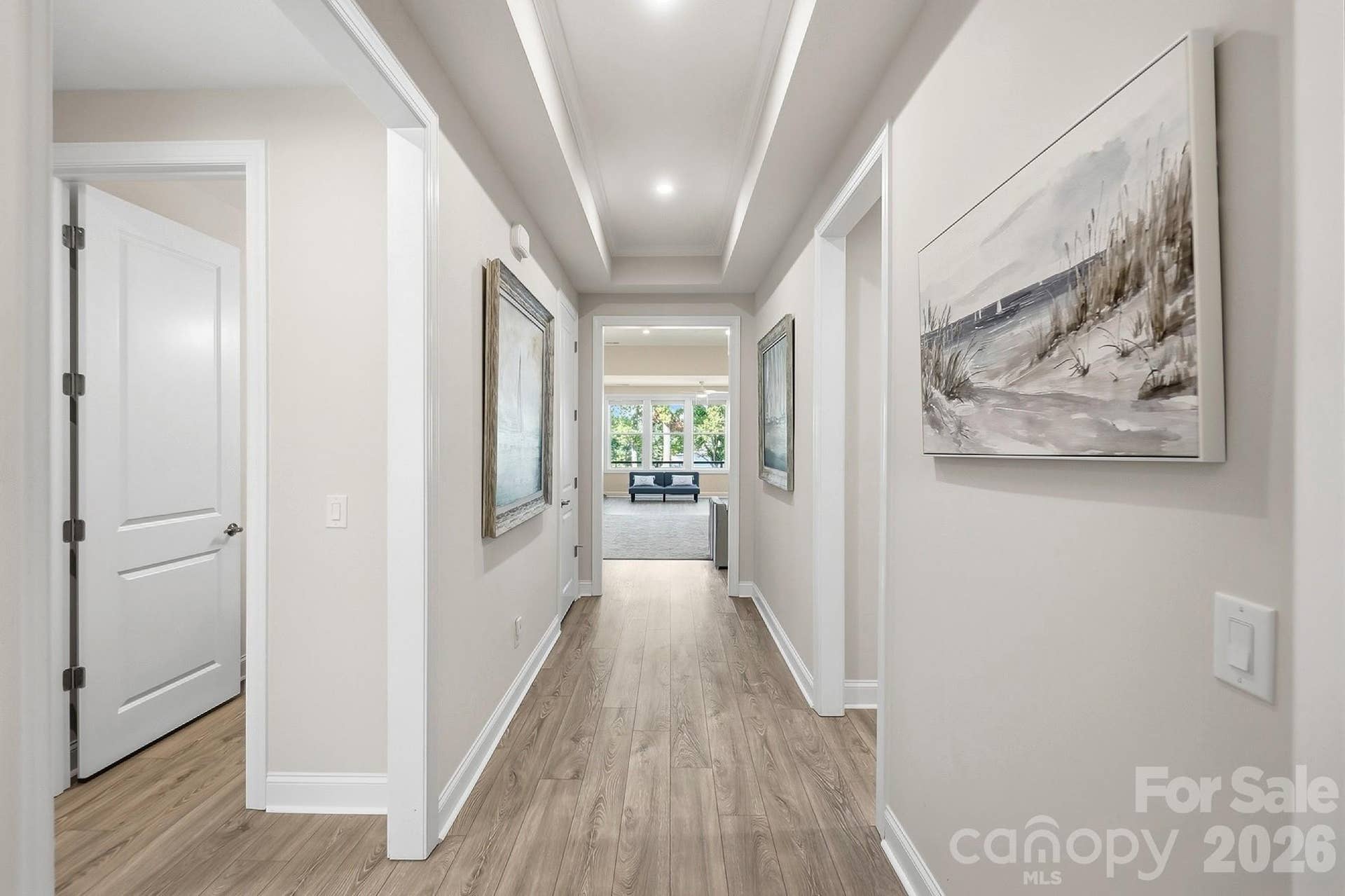 8032 Longwaters Court, York, SC 29745 You'll love the inviting open floorplan designed for both everyday living and entertaining boasting Luxury vinyl flooring, rich molding, 10 foot ceilings, and 8 foot doors