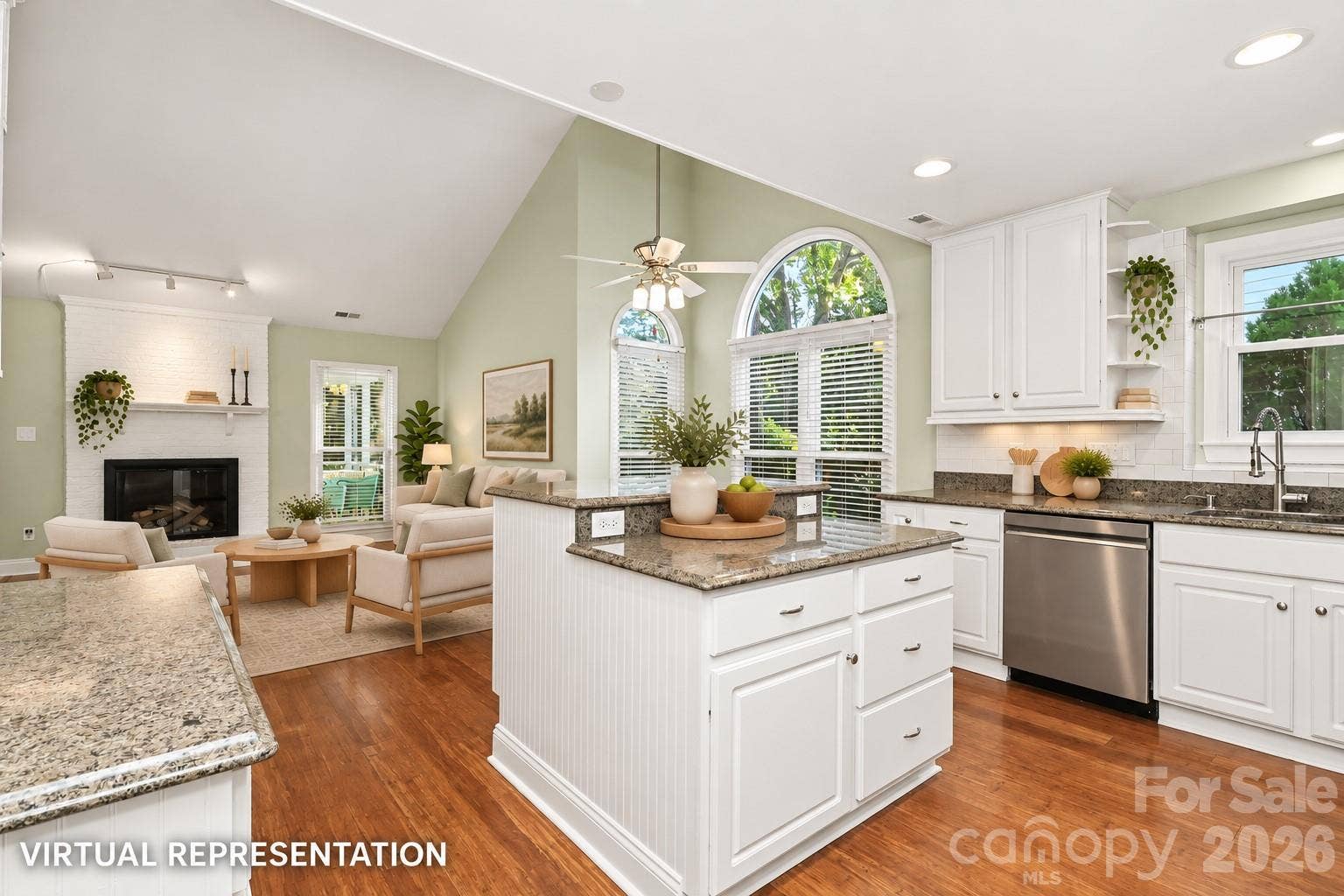 Kitchen featuring island, gas range, stainless