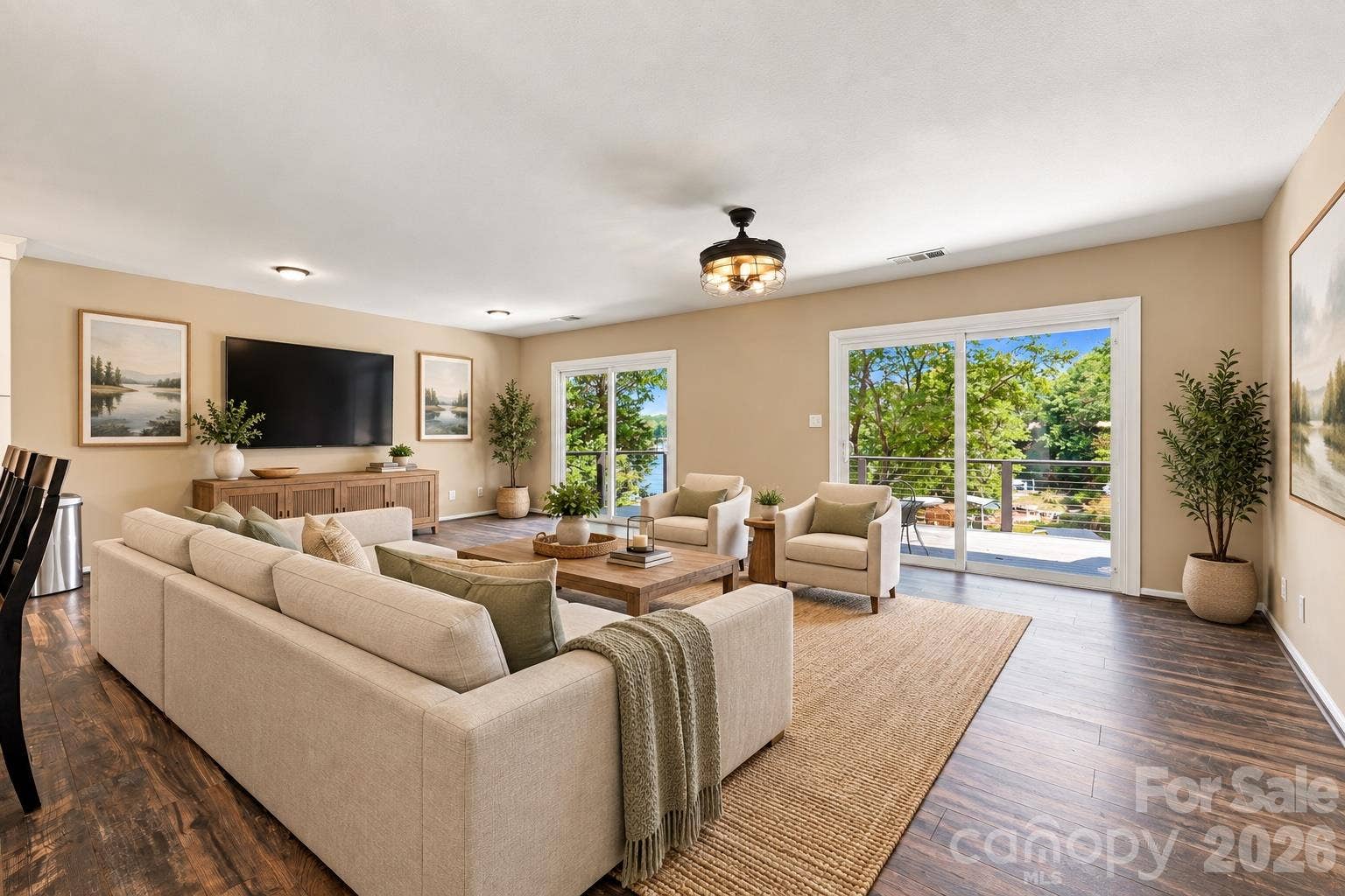 Virtually Staged Family Room with views of the lake and upper deck