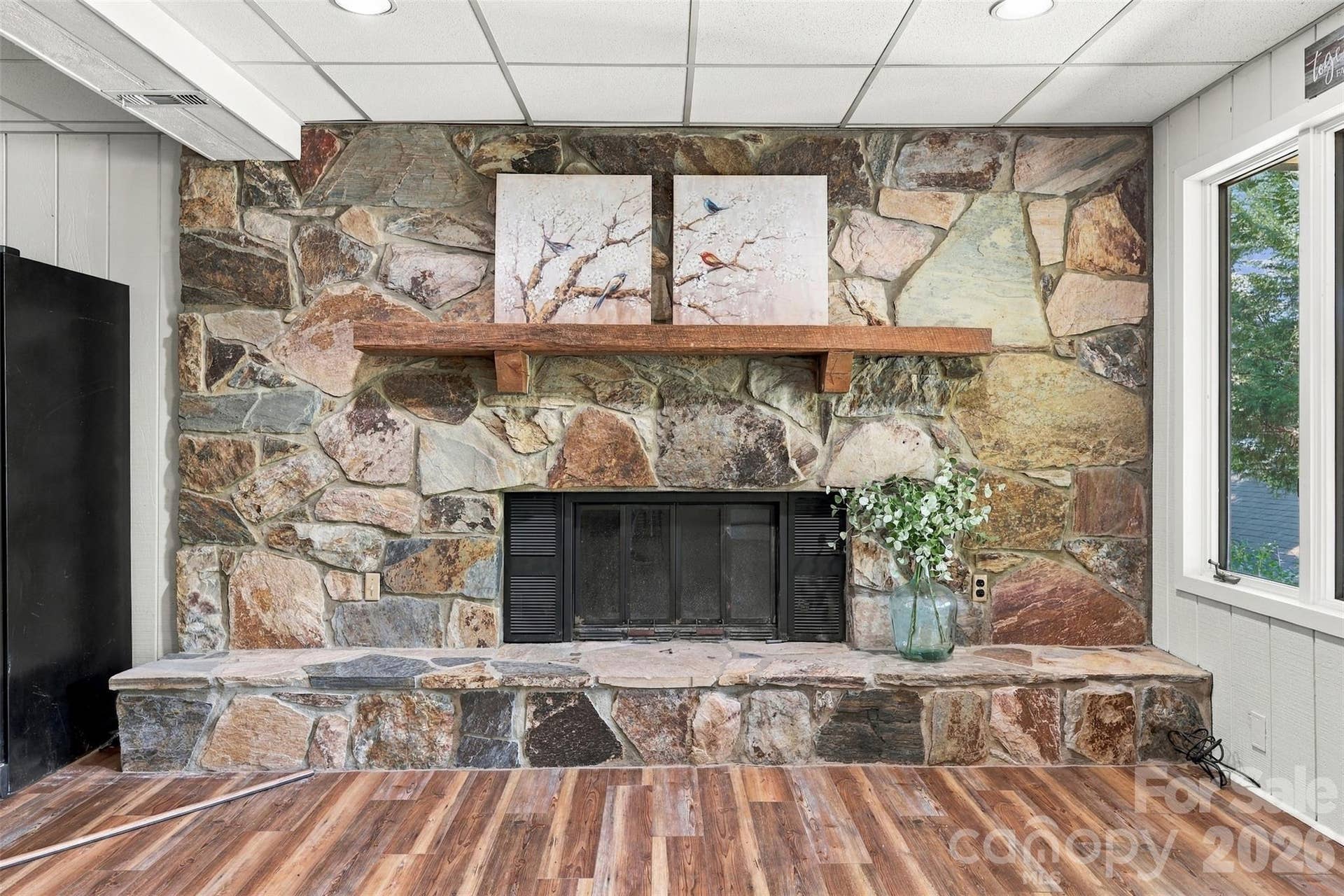 Lower level Rec/ Bonus room with wood burning fireplace and fantastic water views