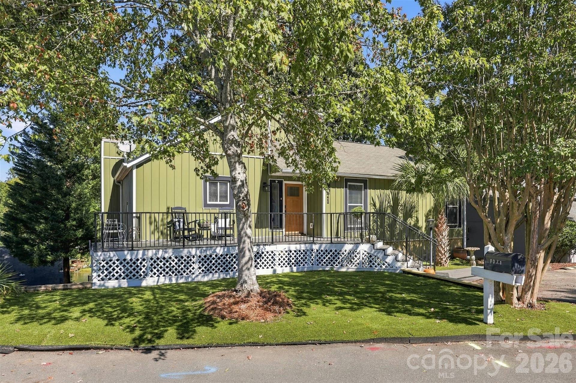 Front of home on cul-de-sac. Large front porch with composite decking