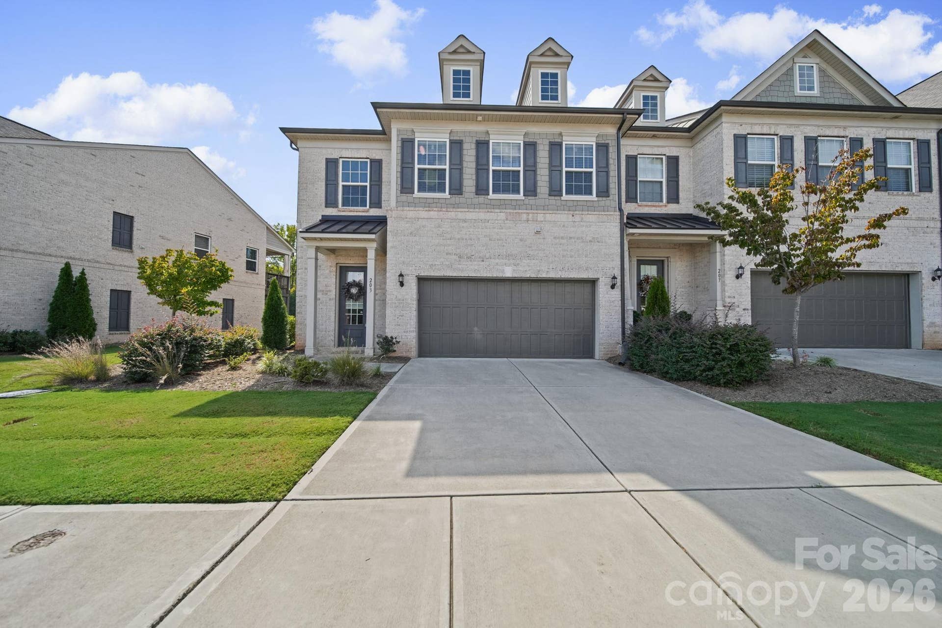 203 Heathbrook Lane, Waxhaw, NC 28173 Front, with a double garage