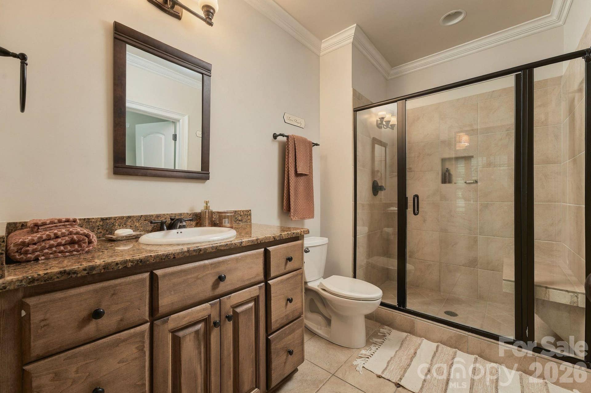 Full basement bathroom with walk-in tile shower