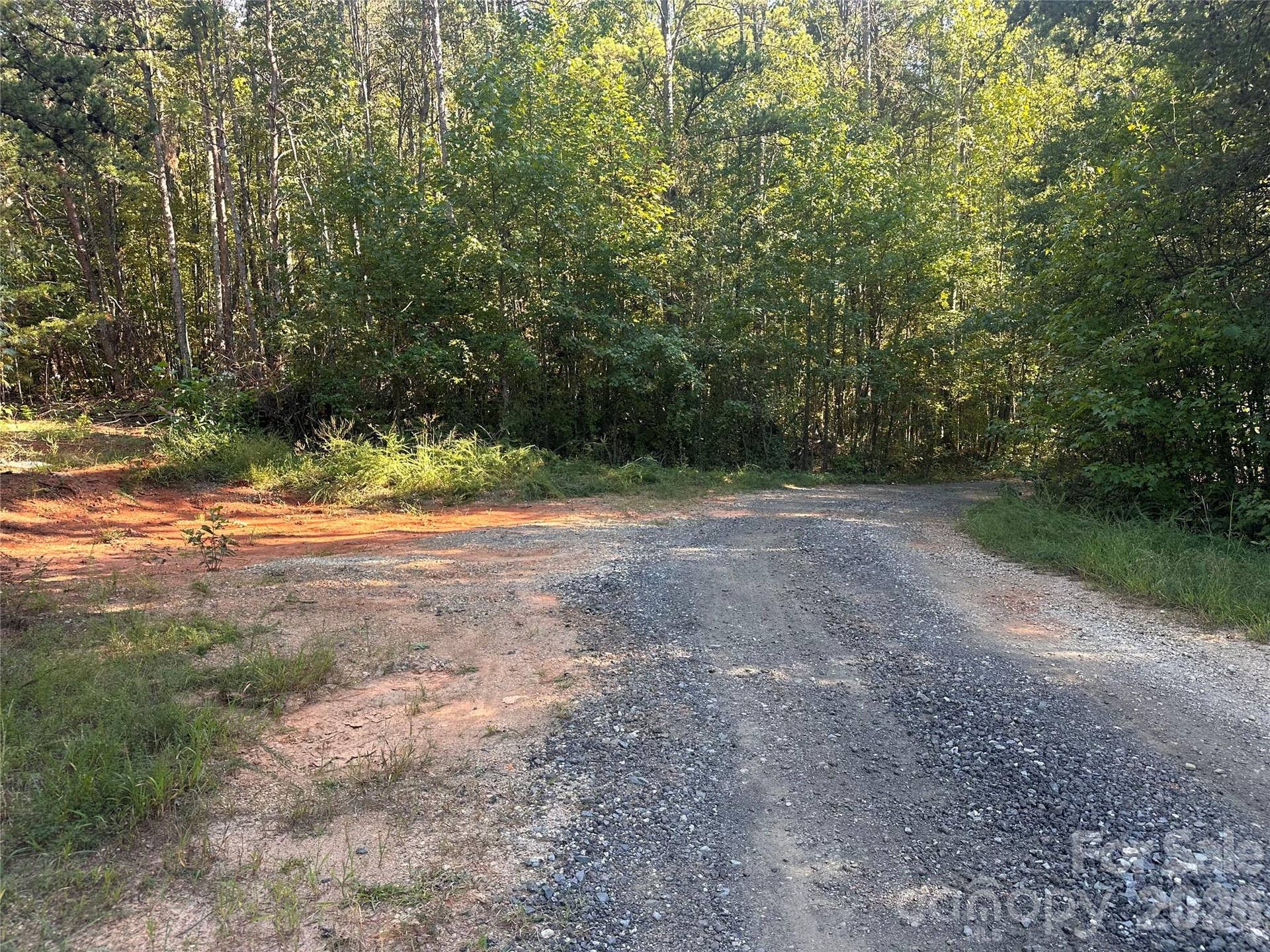 81 Meandering Lane, Lincolnton, NC 28092 Gravel Road frontage of corner lot.