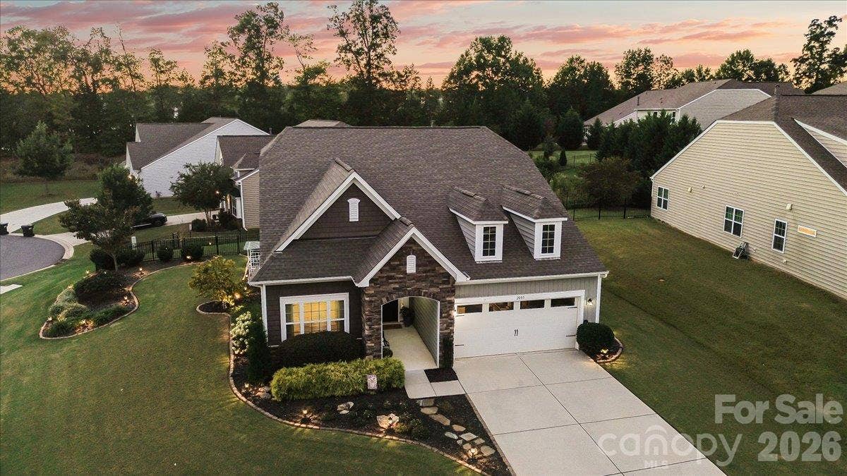 2003 Harvest Time Lane, Waxhaw, NC 28173 Corner lot with the best curb appeal and landscape lighting throughout
