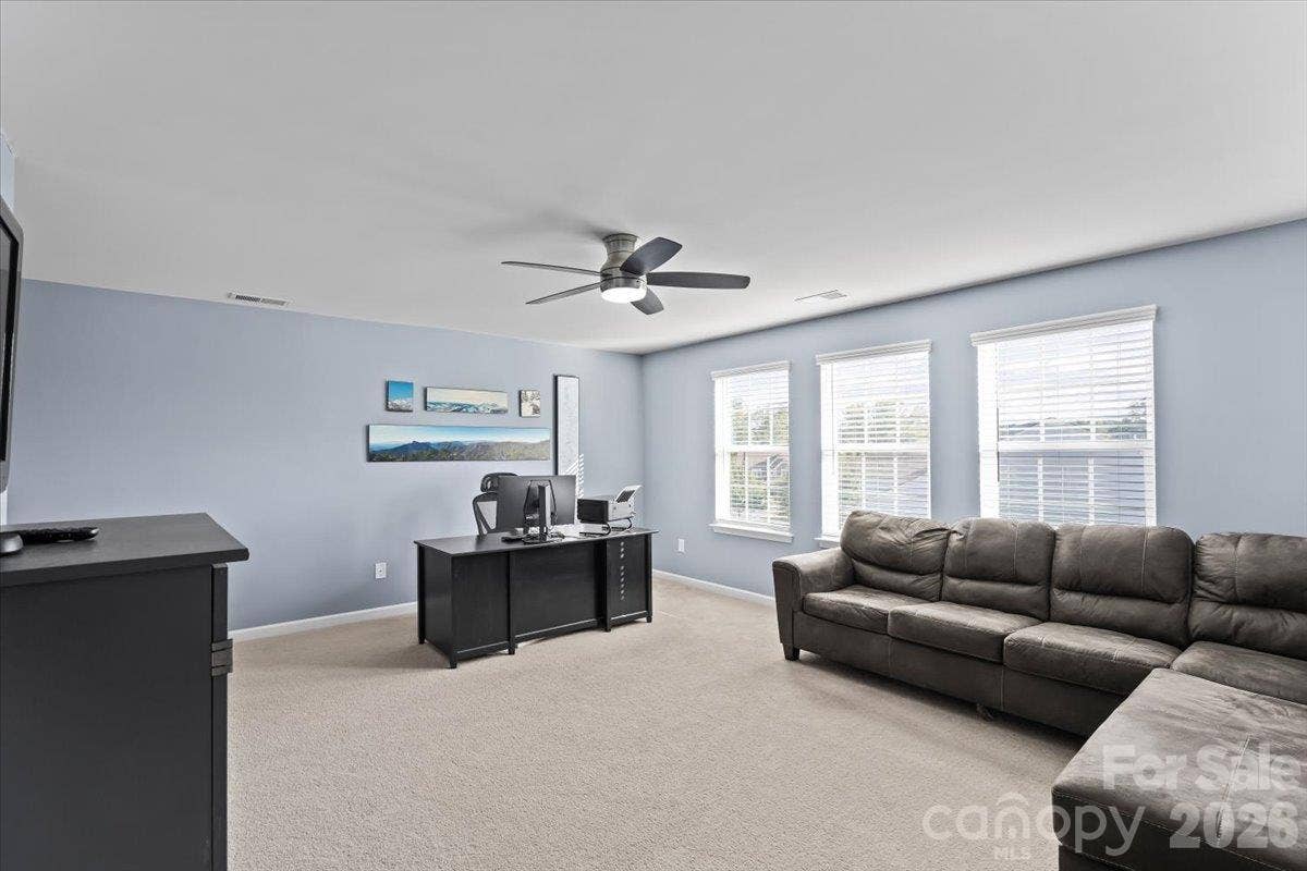 2003 Harvest Time Lane, Waxhaw, NC 28173 Spacious upstairs Loft can be used as office, flex space, movie room, game room or hobby room, 3 windows allow for lots of natural light