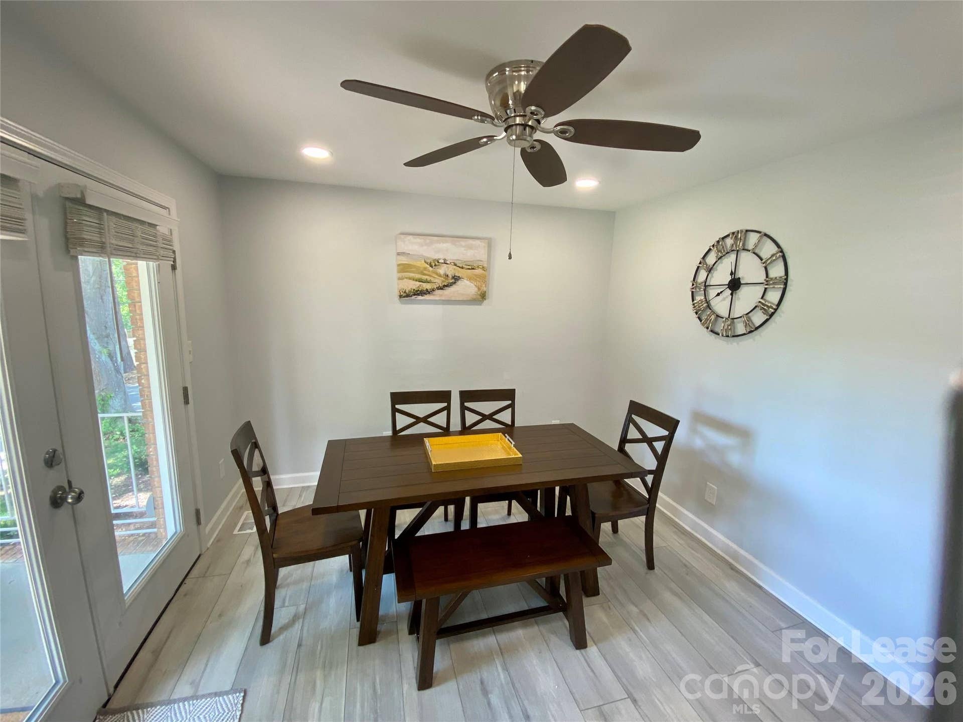 Dining room next to the kitchen with light from outside