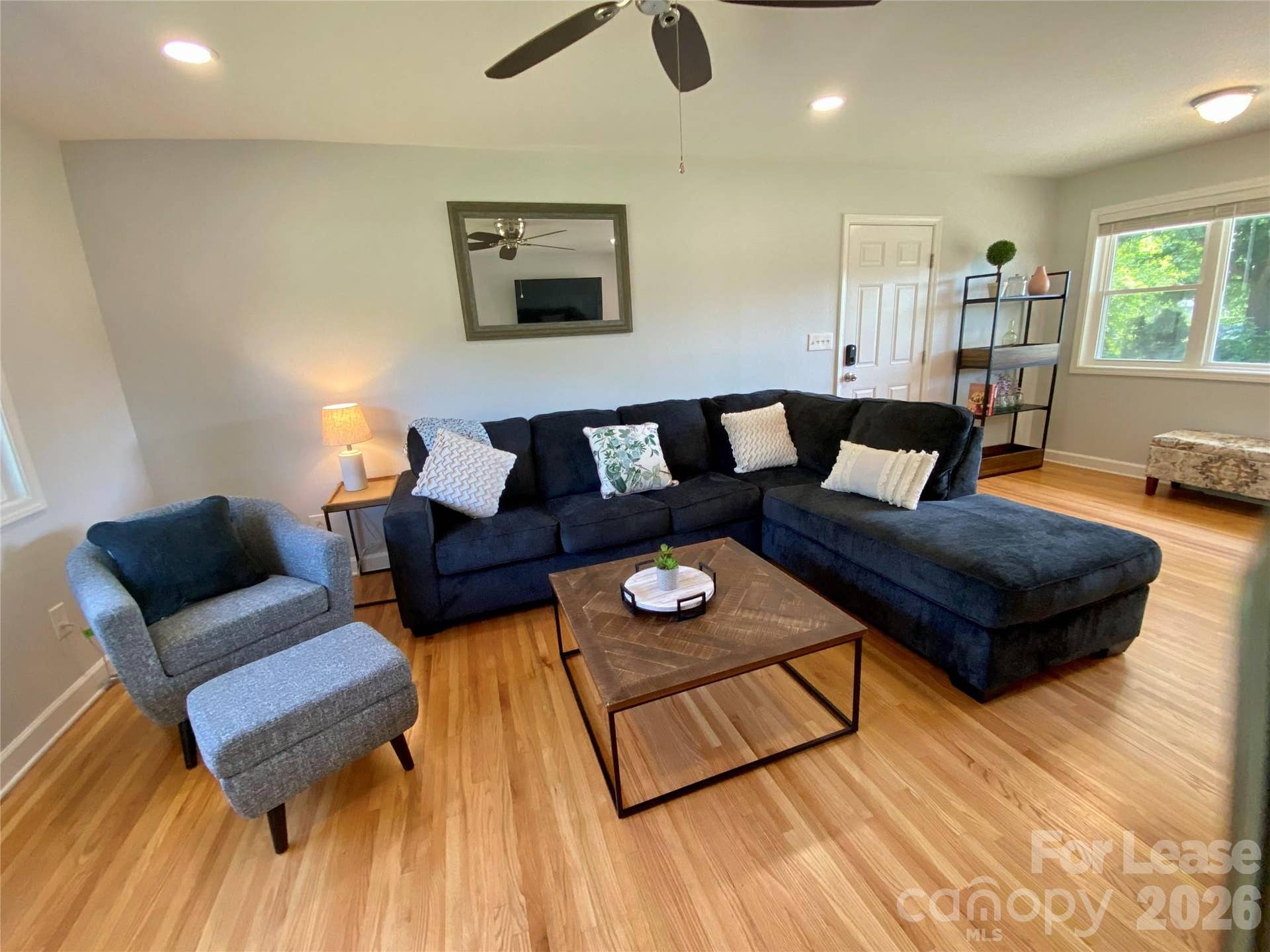 Open living area with furniture included