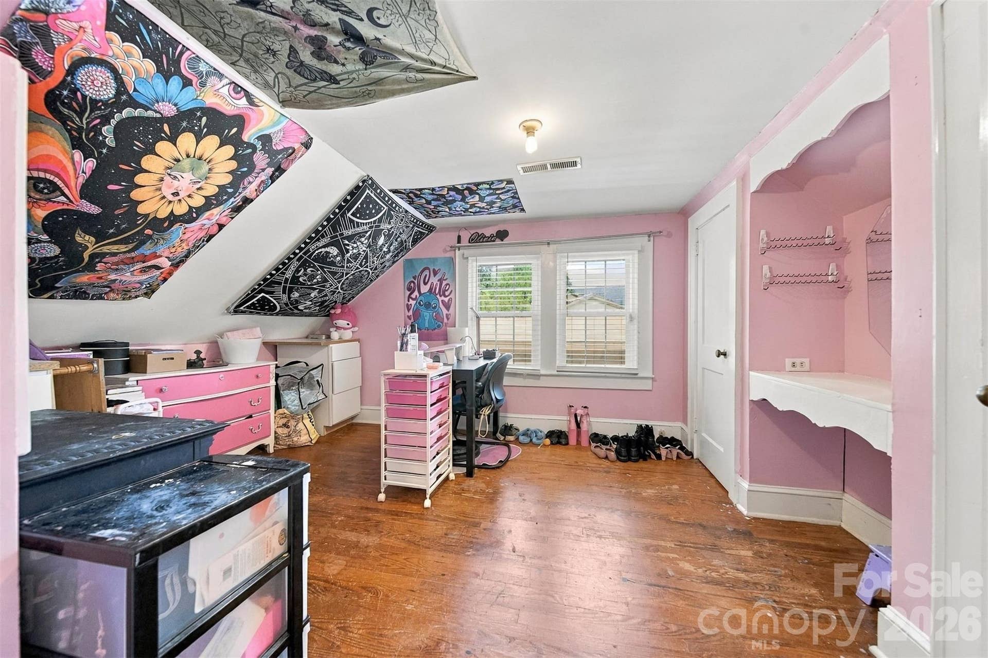 office? craft room? Huge amount of storage in a walk through closet behind the built in vanity!