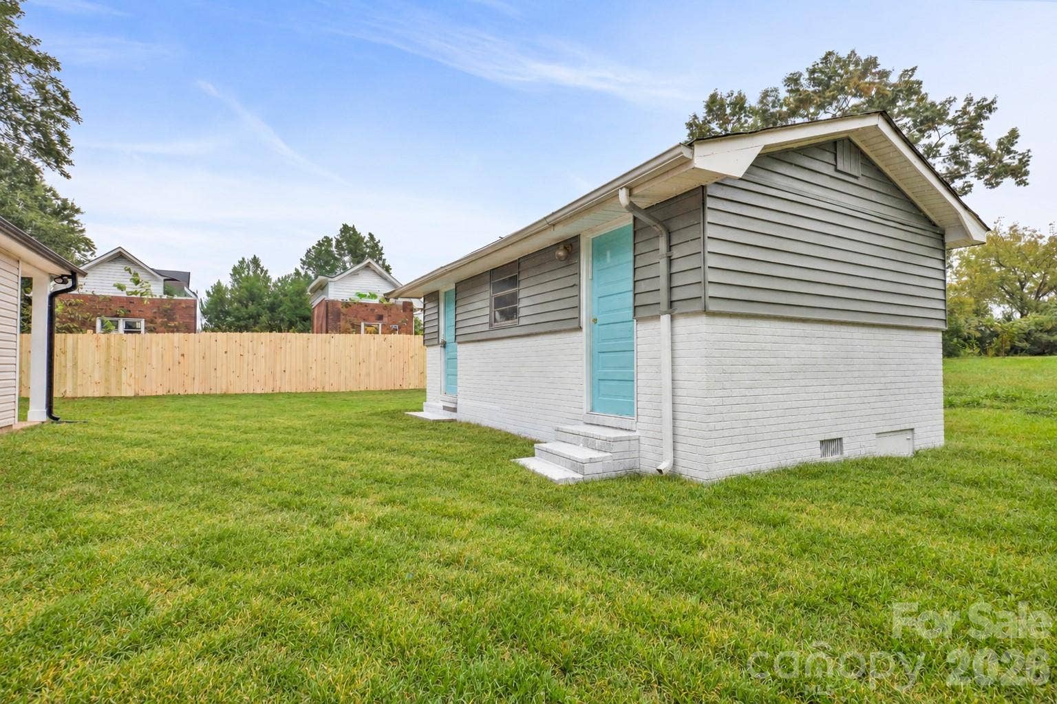 807 Cedar Street, East Spencer, NC 28039 Virtually staged grass, Shed convey as is