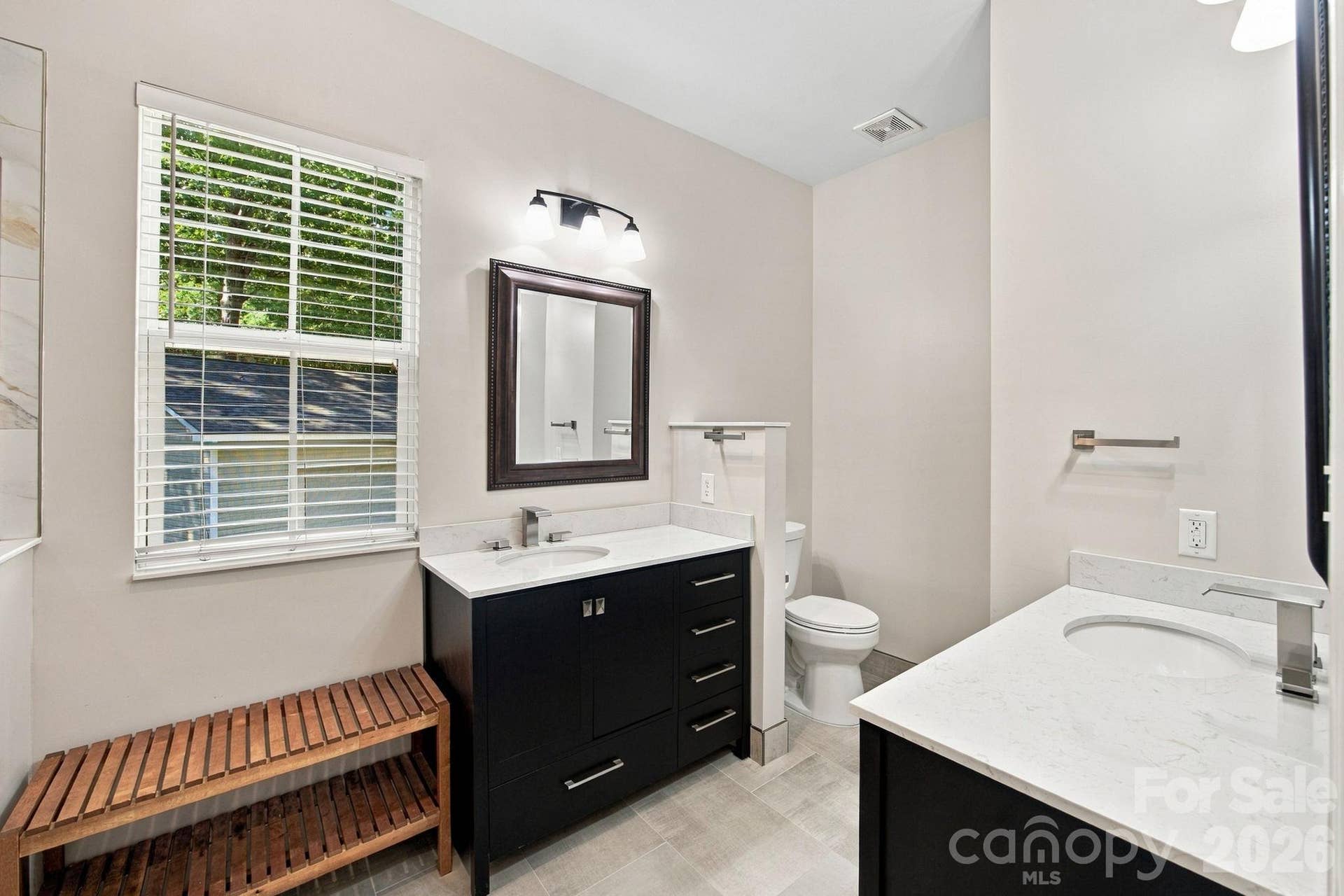 Double vanity main level primary suite