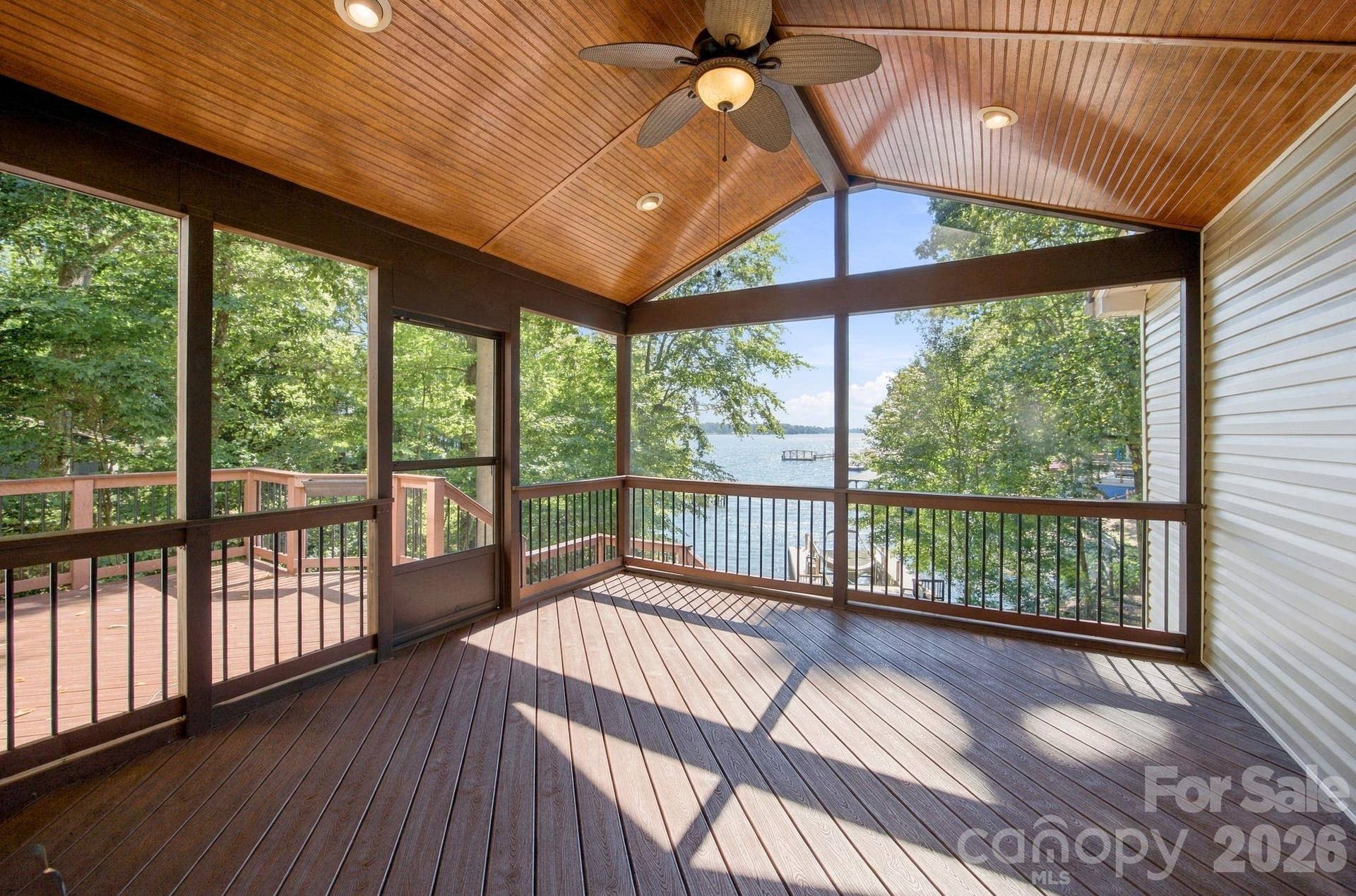 Screened-in deck off of living room on main level