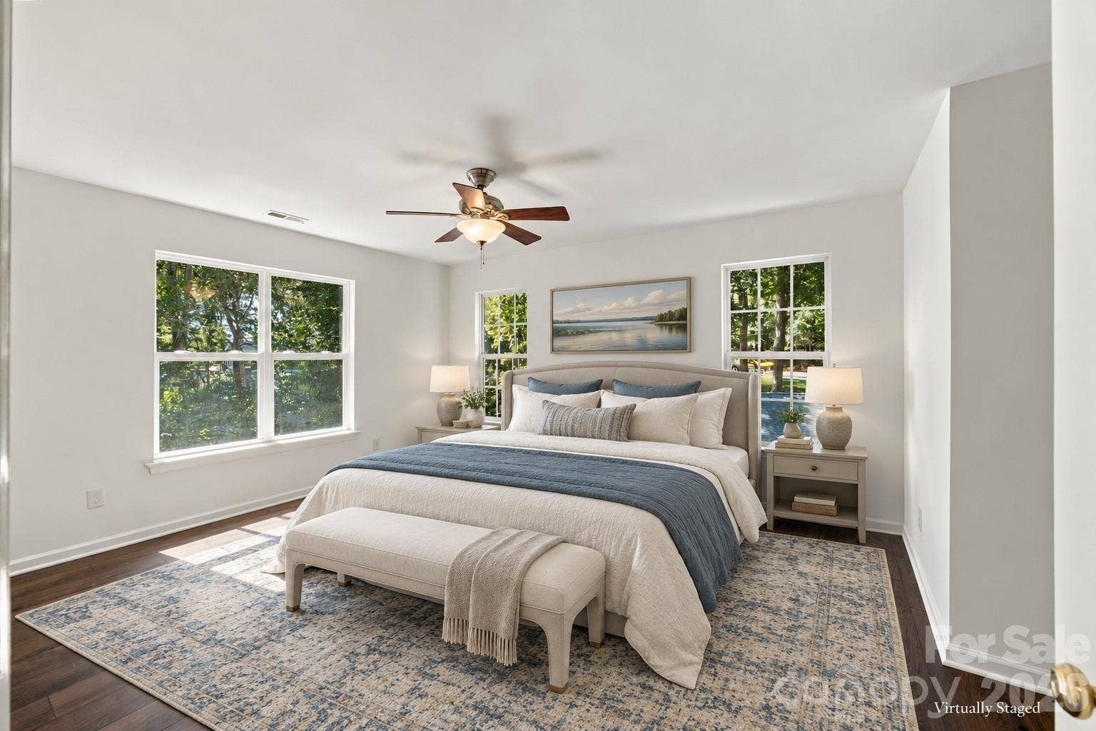 Upper level primary suite staged