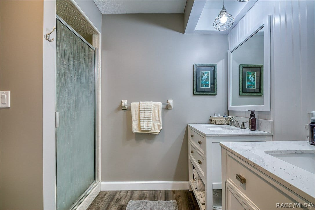 23 Dogwood Drive, Homosassa, FL 34446 Master Bath with dual sinks and Shower. Fully furnished with linens.