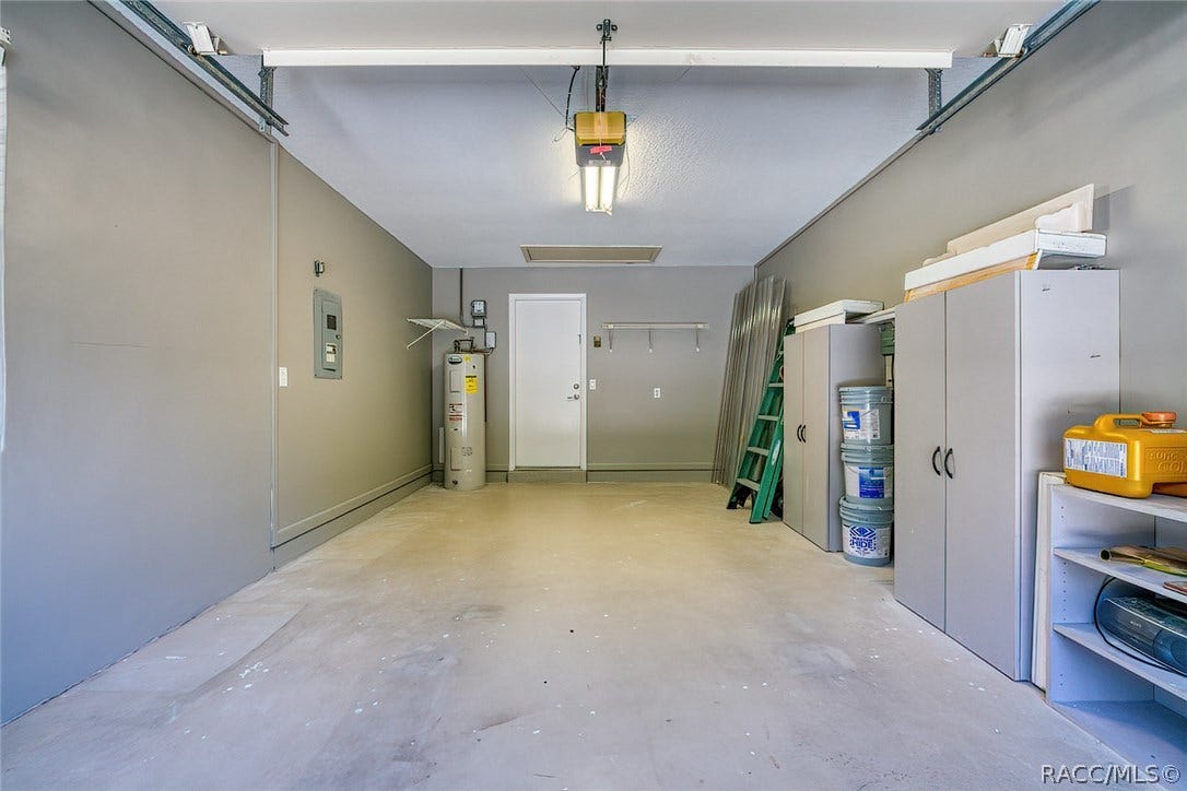 23 Dogwood Drive, Homosassa, FL 34446 One car garage with auto opener and remotes
