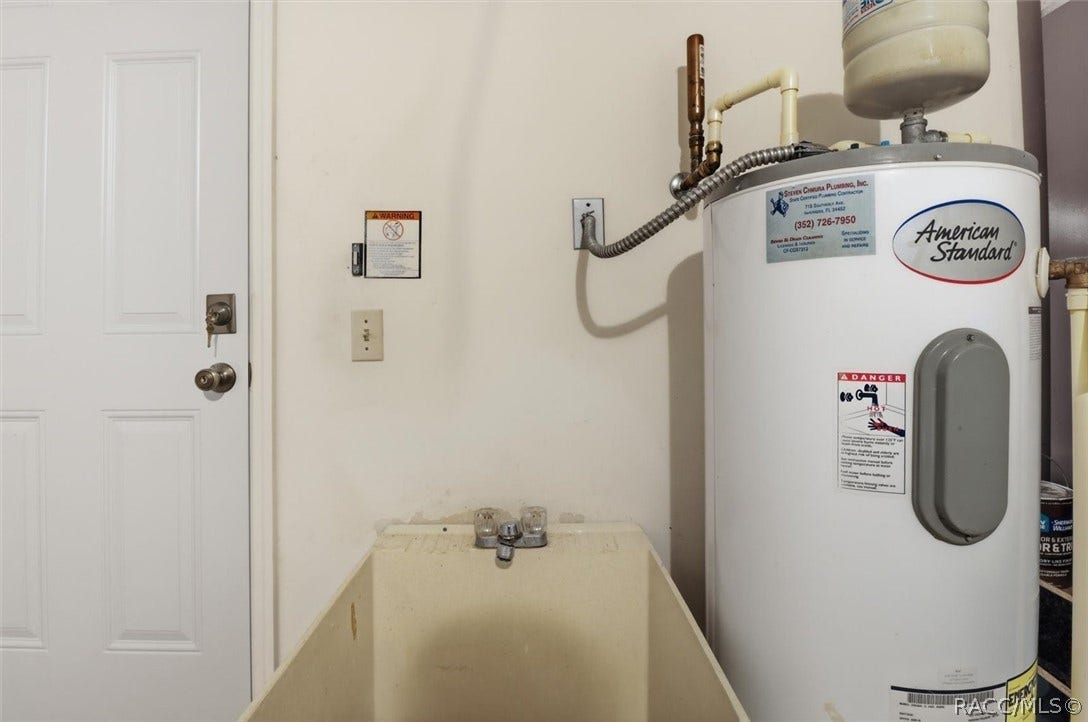 966 W Starjasmine Place, Beverly Hills, FL 34465 Laundry tub inside garage