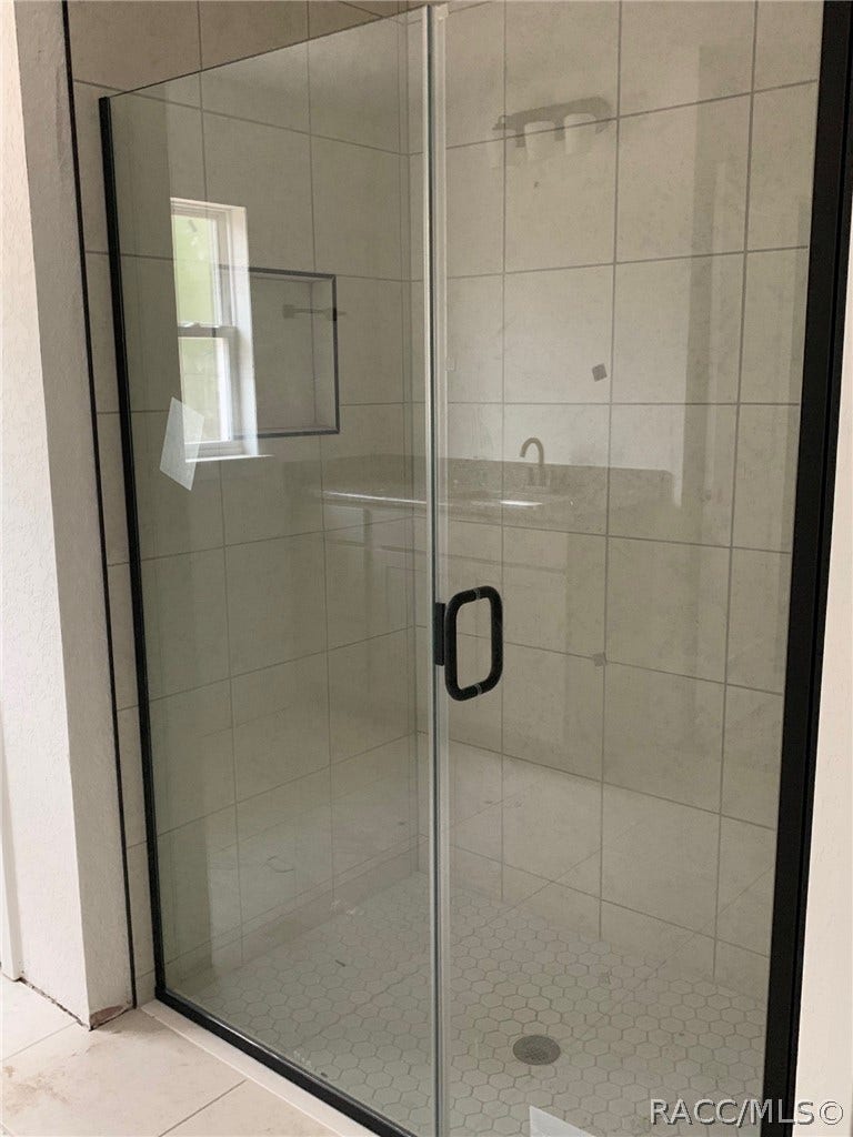 5202 N Allamandra Drive, Beverly Hills, FL 34465 primary bath shower