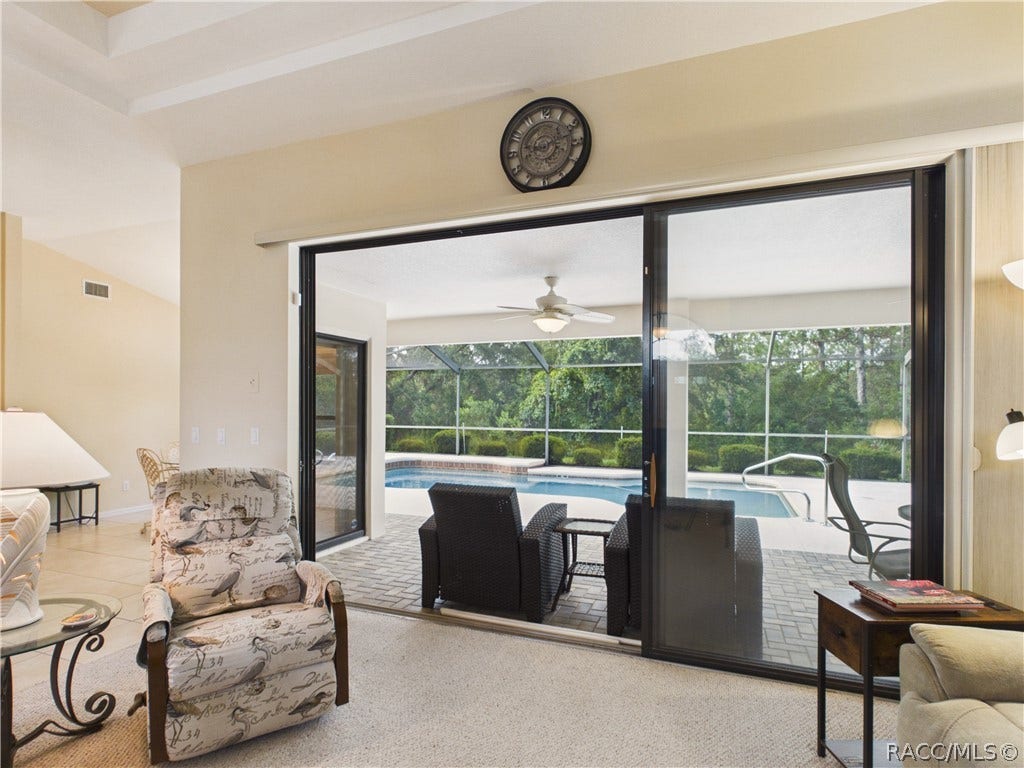 10 Rudbeckia Court, Homosassa, FL 34446 GREAT ROOM 5 HAS SLIDING DOOR ACCESS TO THE POOL