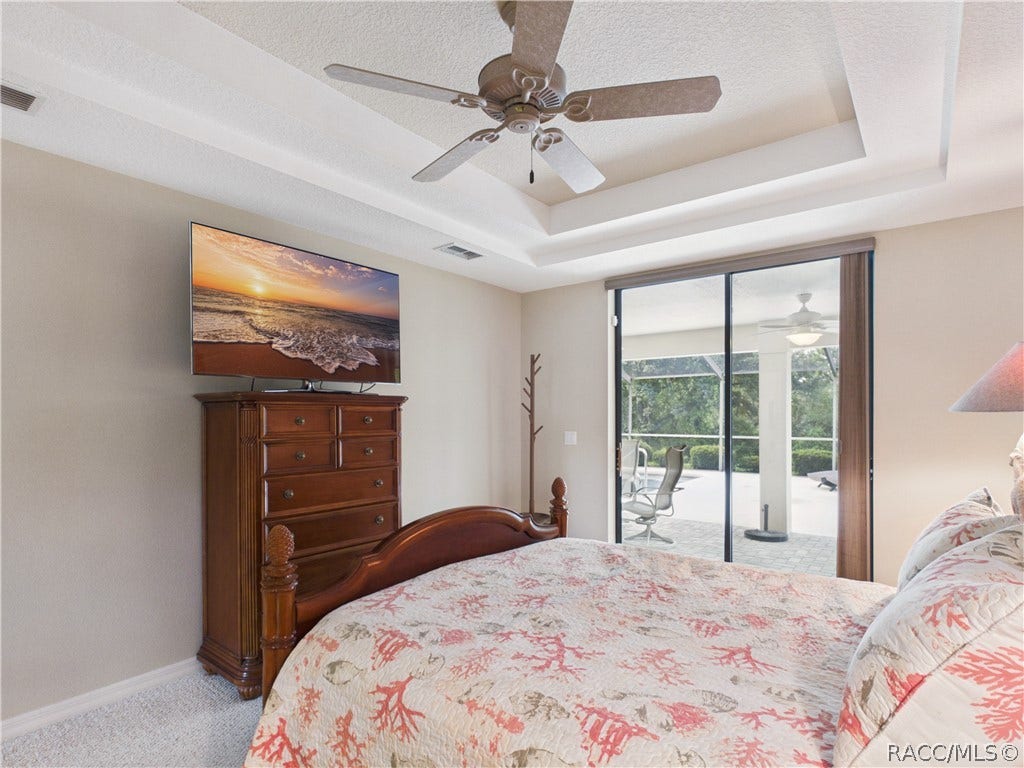 10 Rudbeckia Court, Homosassa, FL 34446 MASTER BEDROO 3 HAS SLIDING DOOR ACCESS TO THE POOL AREA