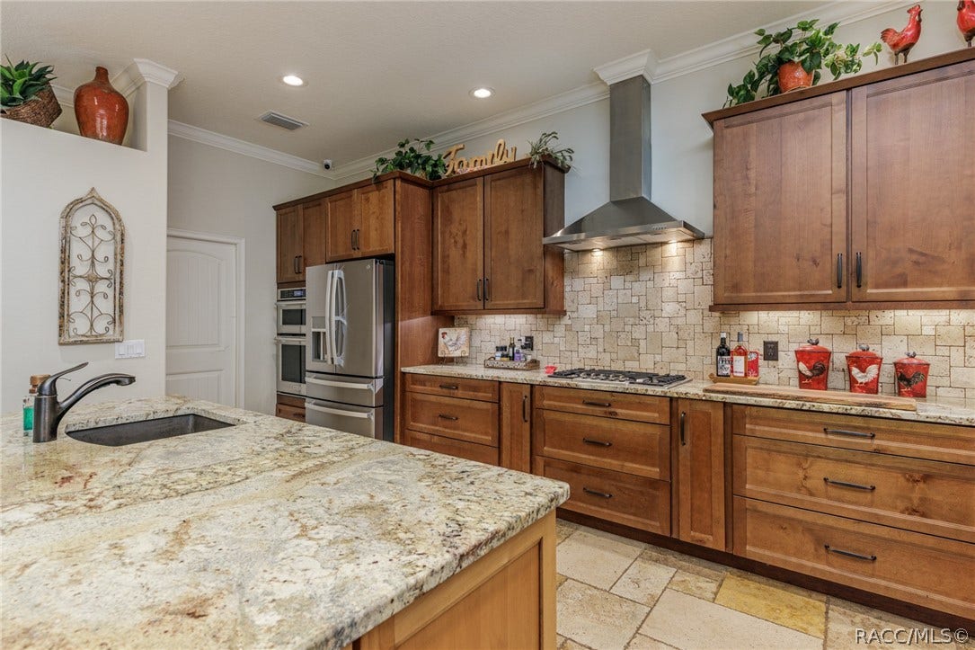 4750 W Mohawk Drive, Beverly Hills, FL 34465 Granite Countertops
Wood cabinets (Tall)