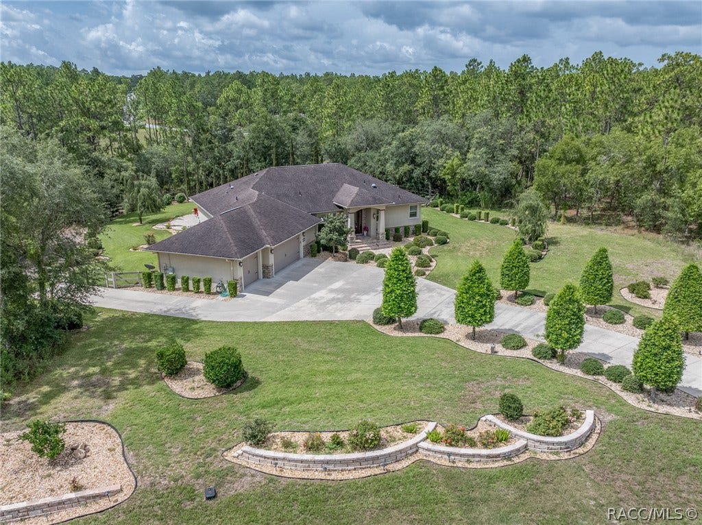 4750 W Mohawk Drive, Beverly Hills, FL 34465 Beautiful tree lined driveway