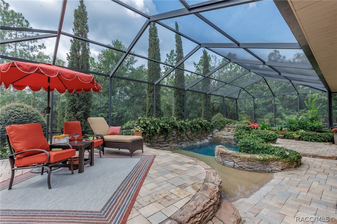 4750 W Mohawk Drive, Beverly Hills, FL 34465 overlooking pool