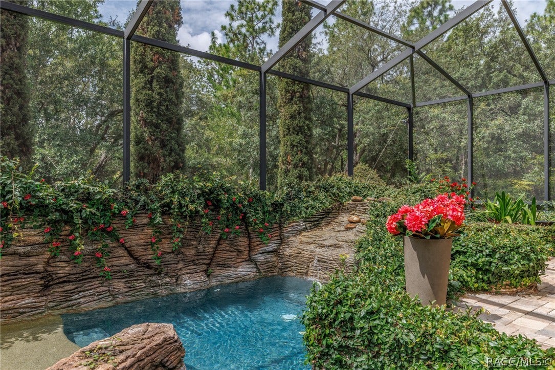 4750 W Mohawk Drive, Beverly Hills, FL 34465 grotto pool w/ waterfall